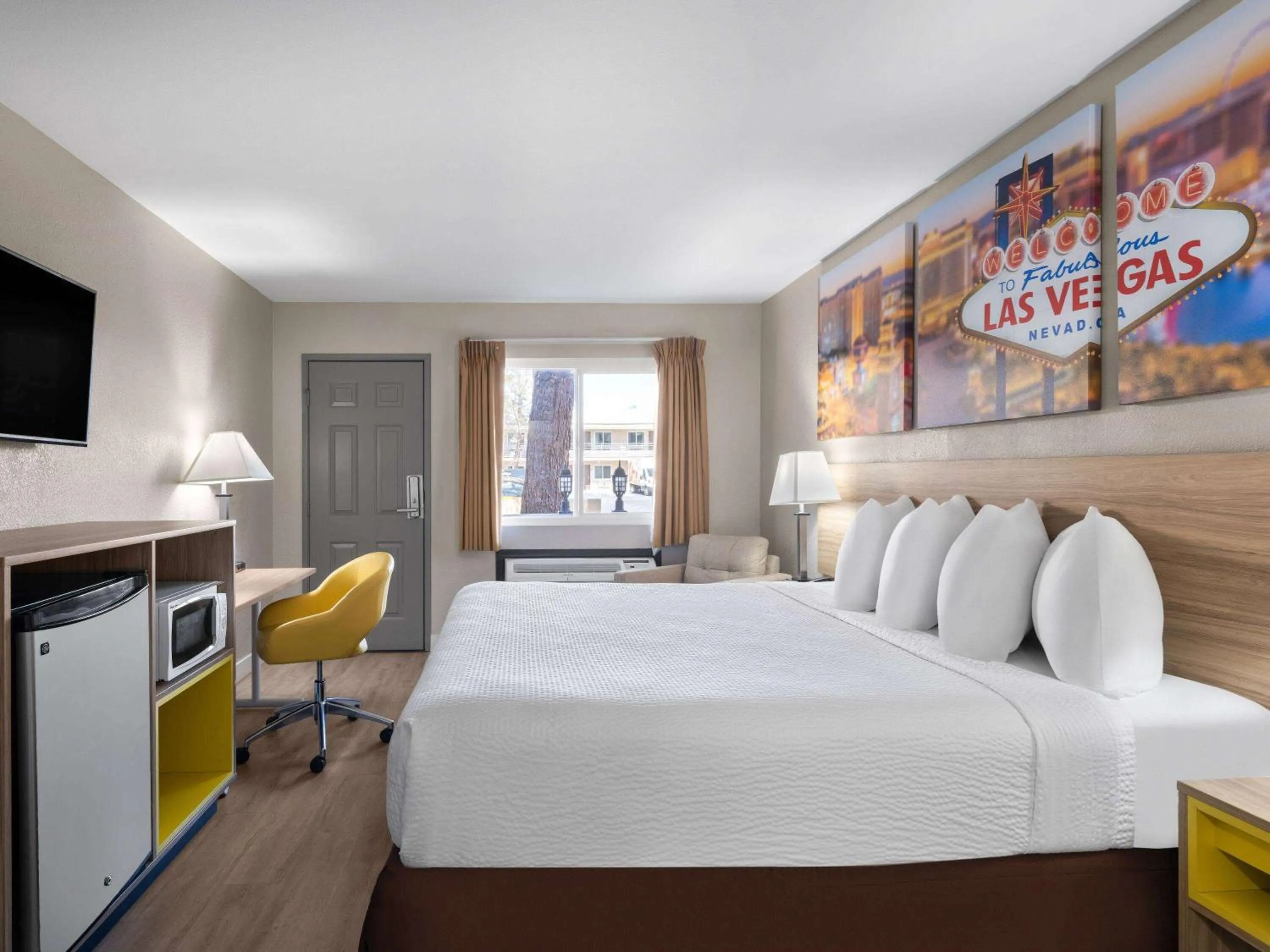 Photo of the whole room, Bed in Days Inn by Wyndham Las Vegas Airport Near the Strip