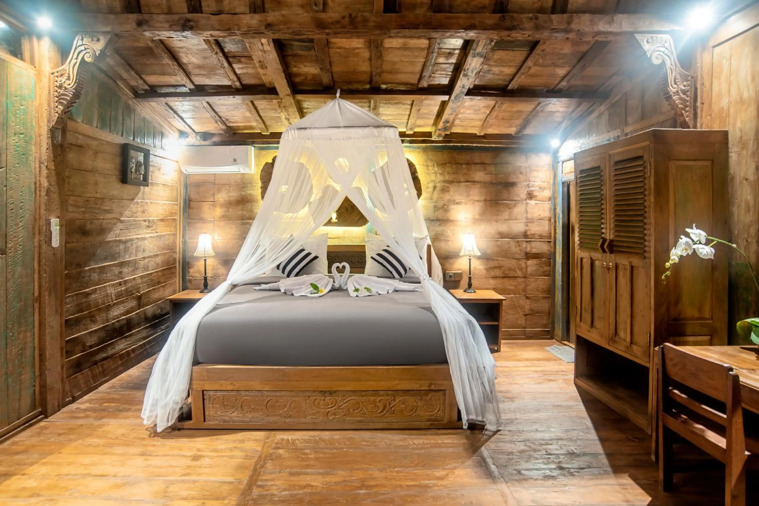 Bed in PNB Bali Villas