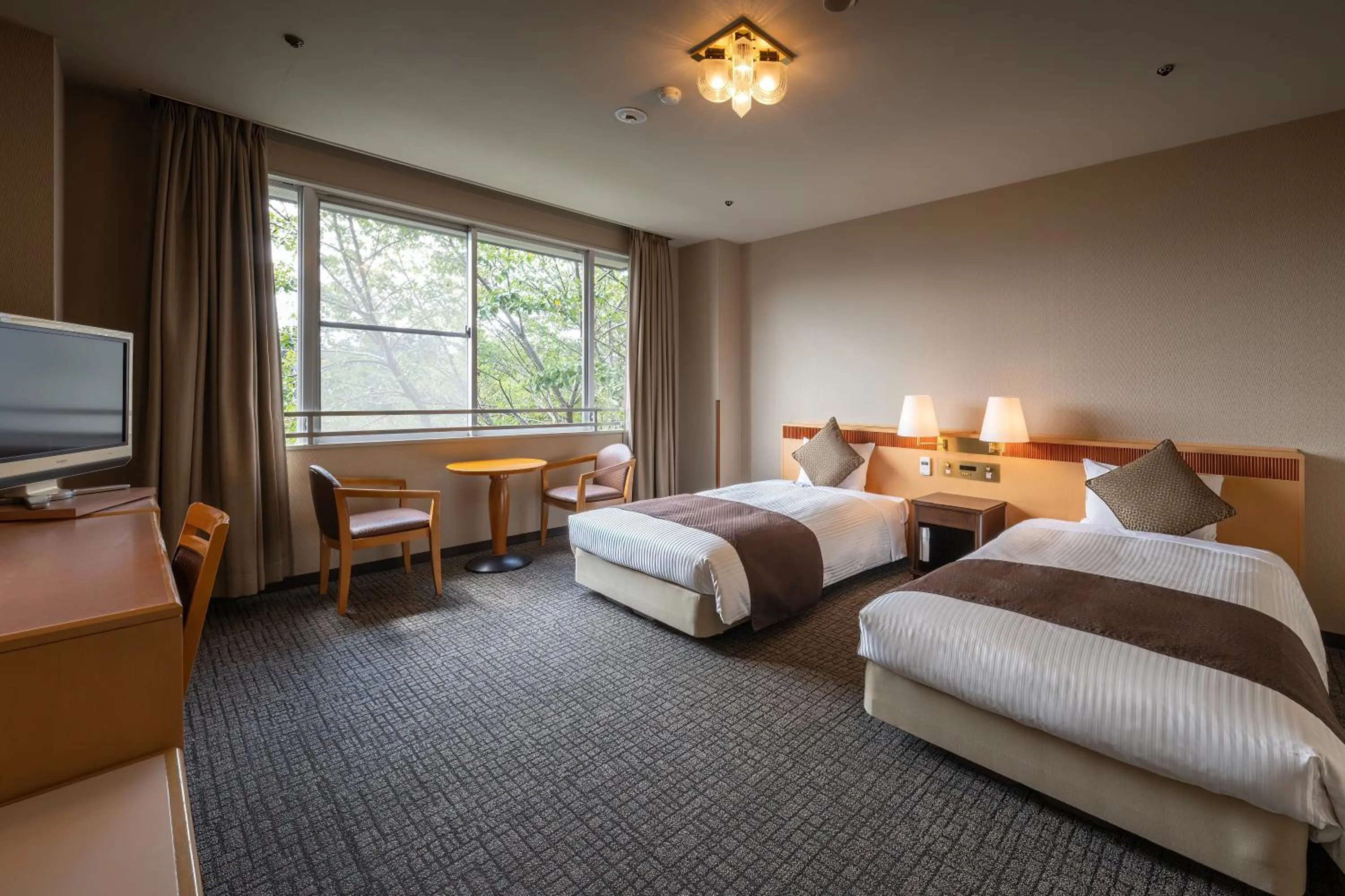 Photo of the whole room, Bed in KAMENOI HOTEL Tondabayashi