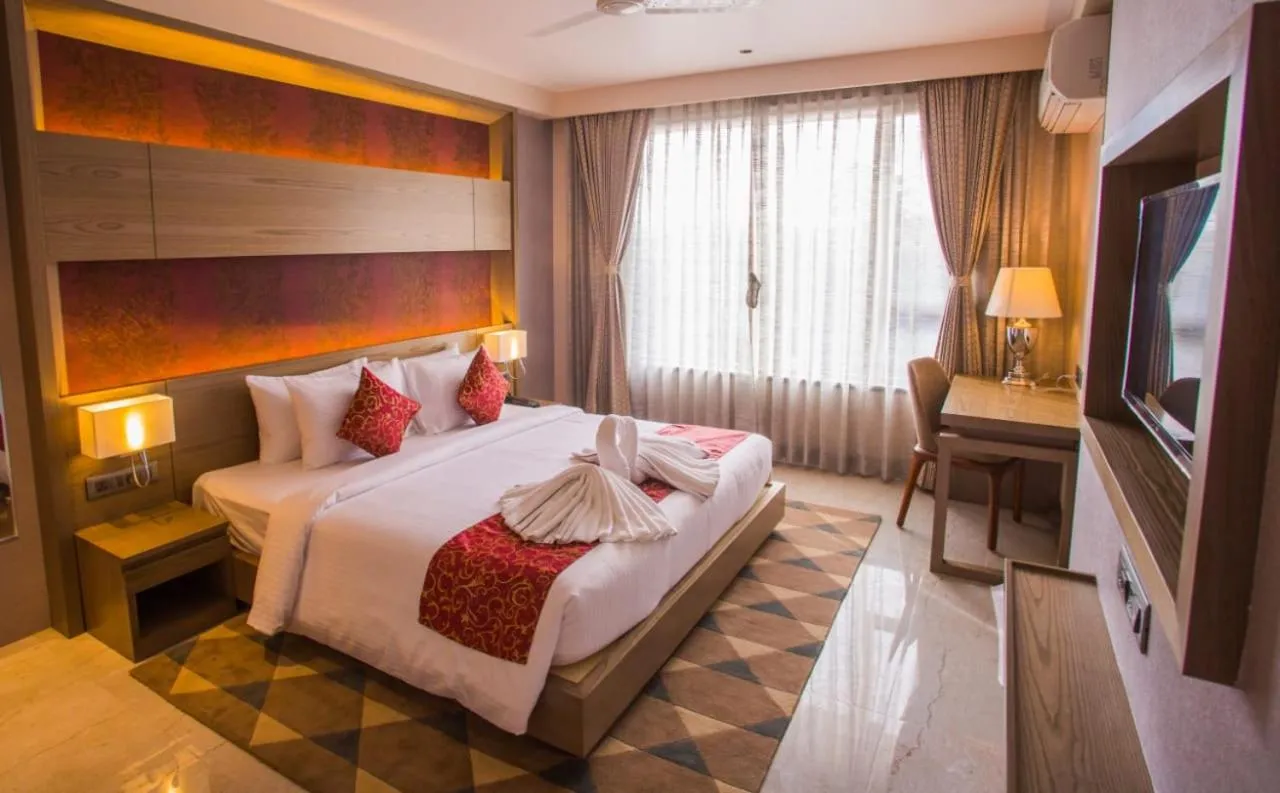 Bed in Hotel Grand Kadamba