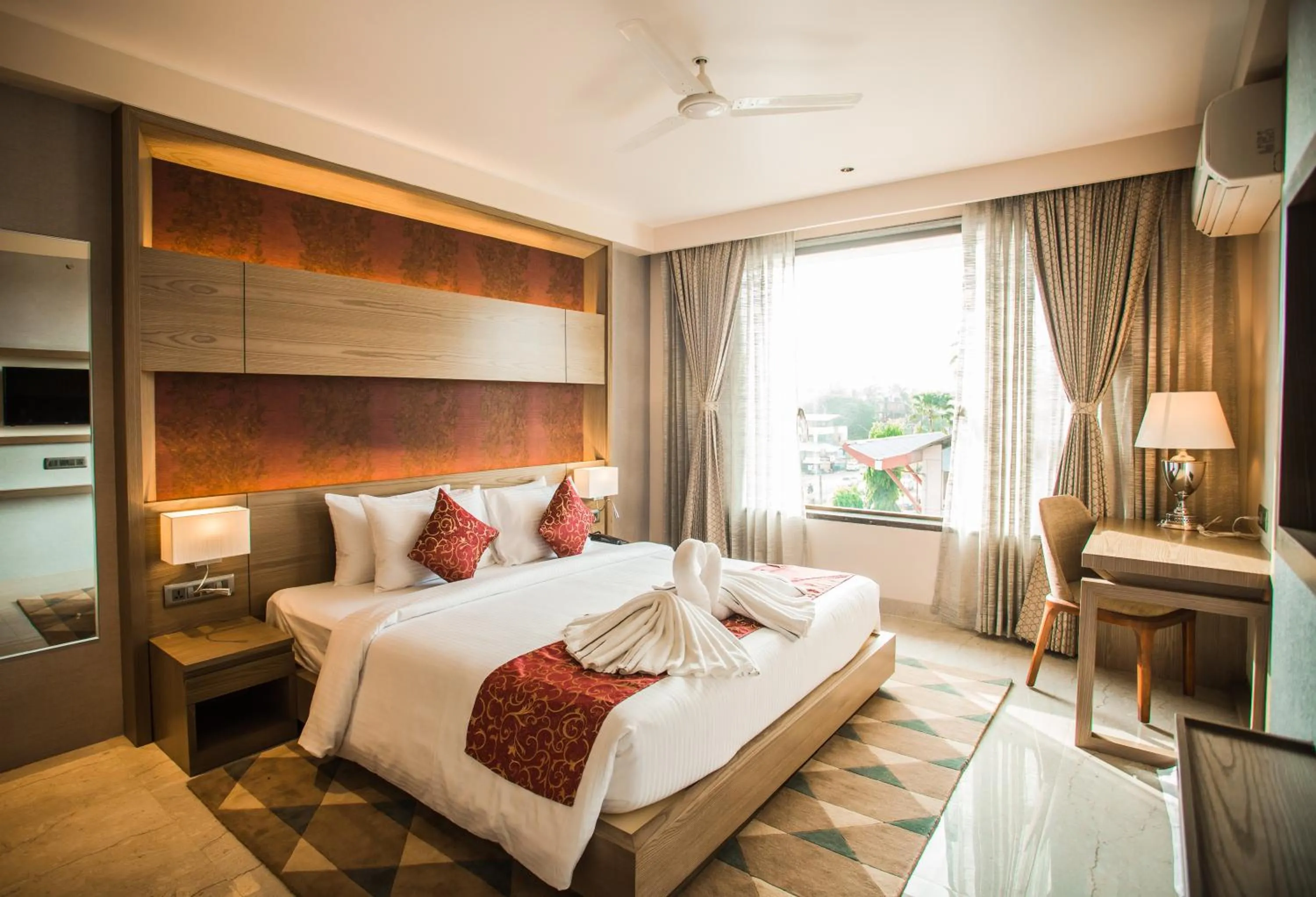 Bed in Hotel Grand Kadamba