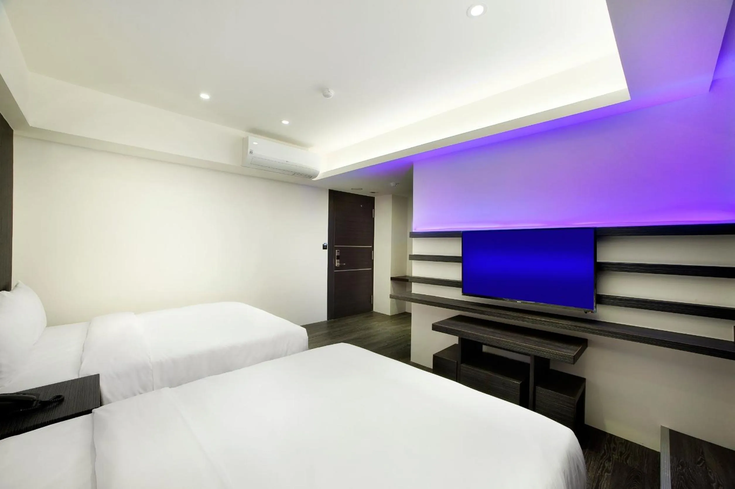 Bed in Seven Fukun Hotel