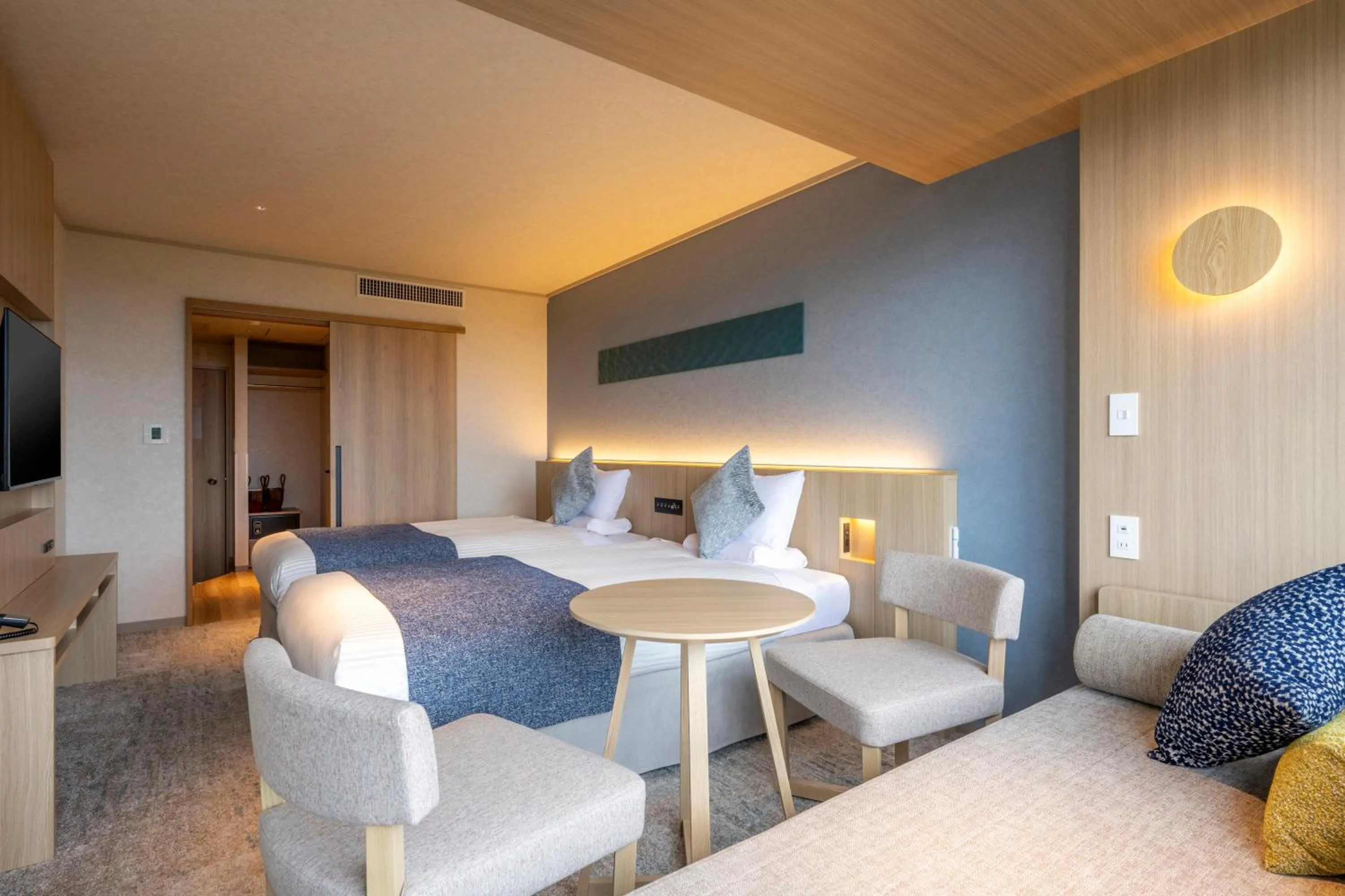 Bed in KAMENOI HOTEL Kamogawa