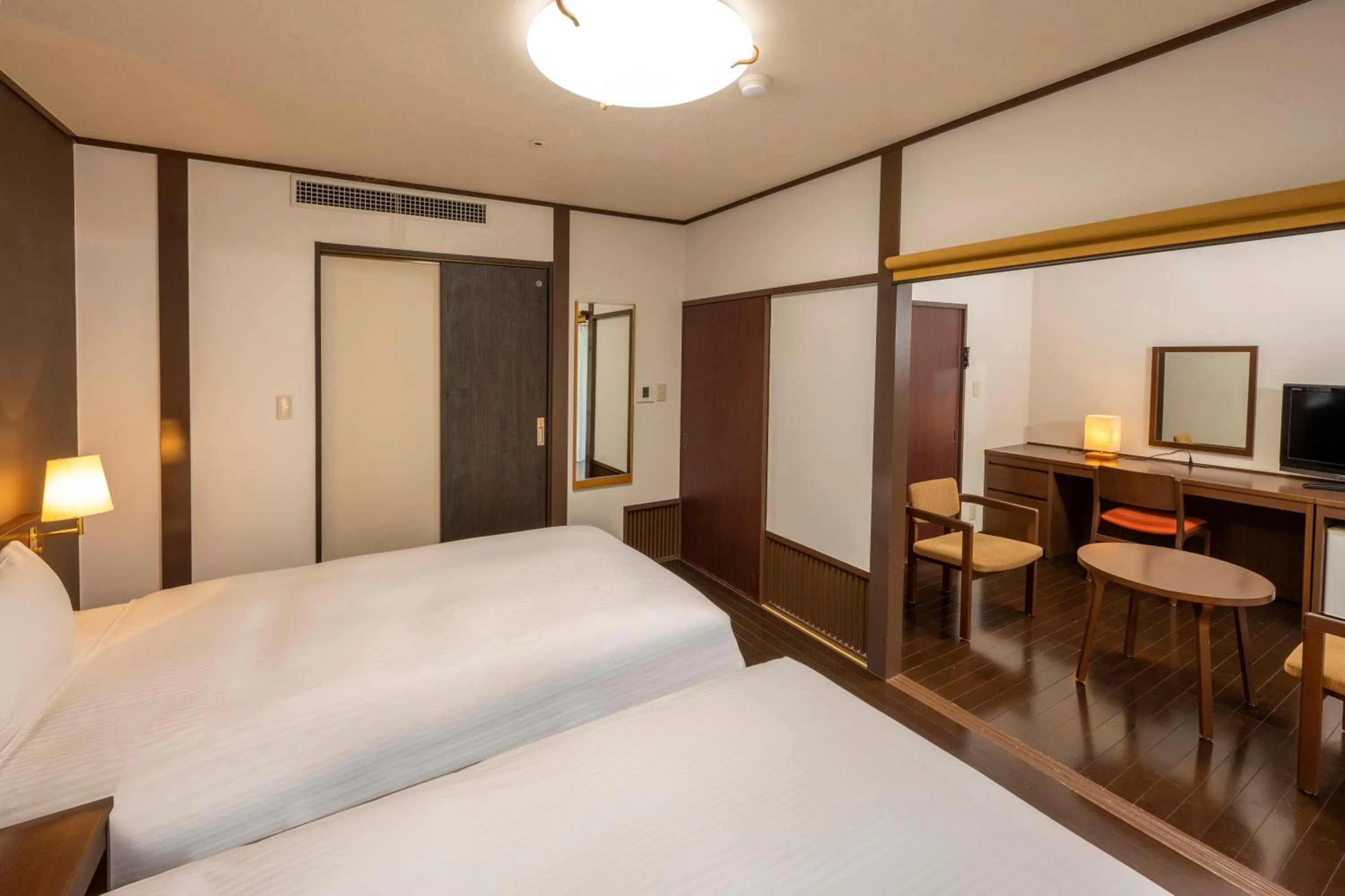 Photo of the whole room, Bed in KAMENOI HOTEL Kamogawa