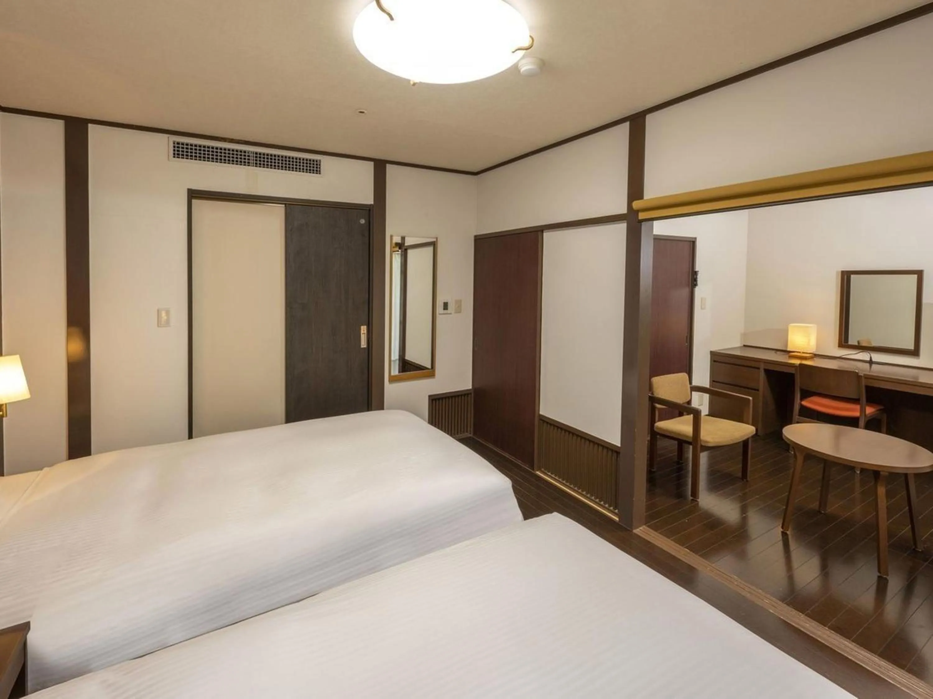 Photo of the whole room, Bed in KAMENOI HOTEL Kamogawa