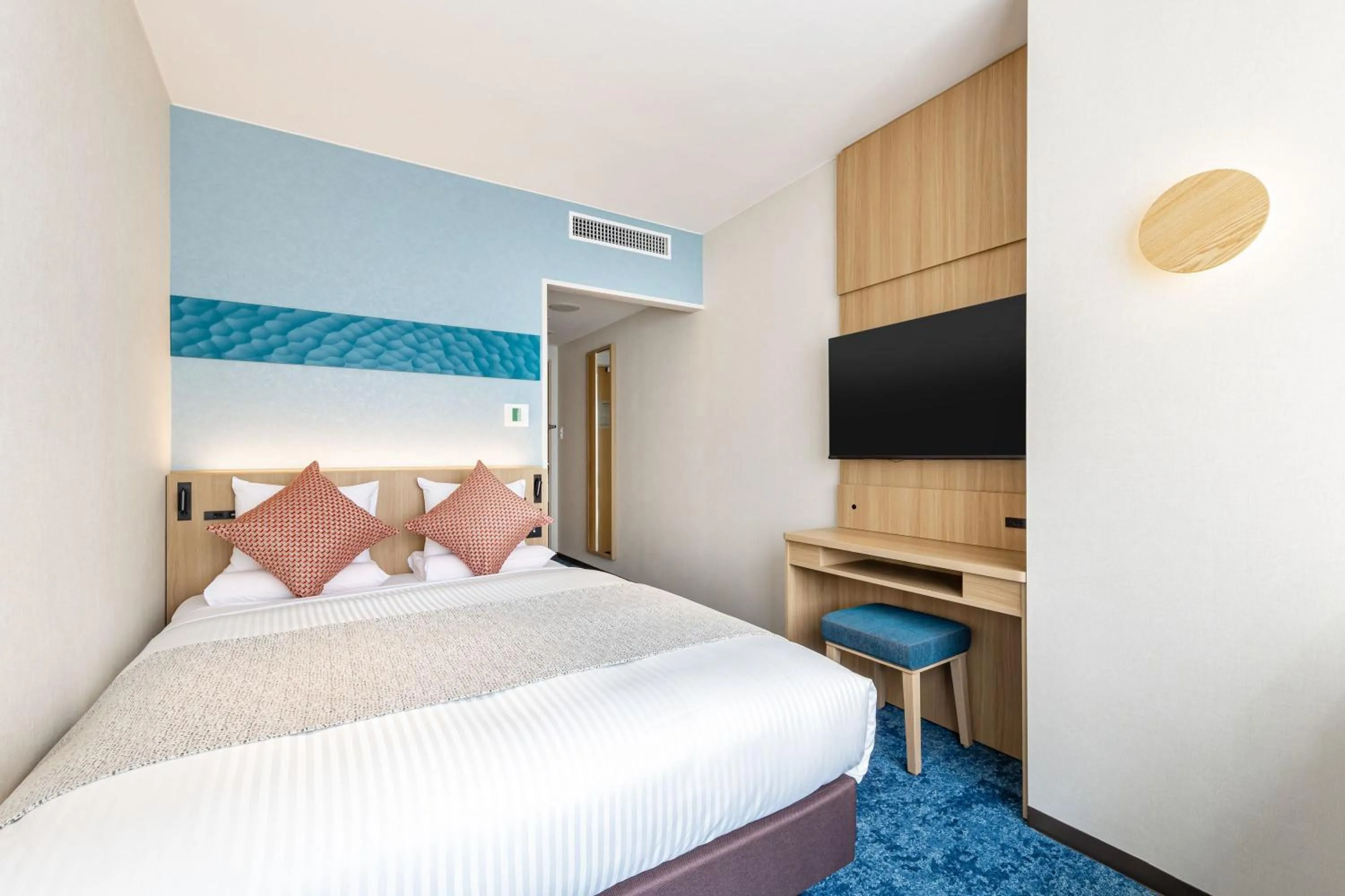 Bed in KAMENOI HOTEL Kamogawa