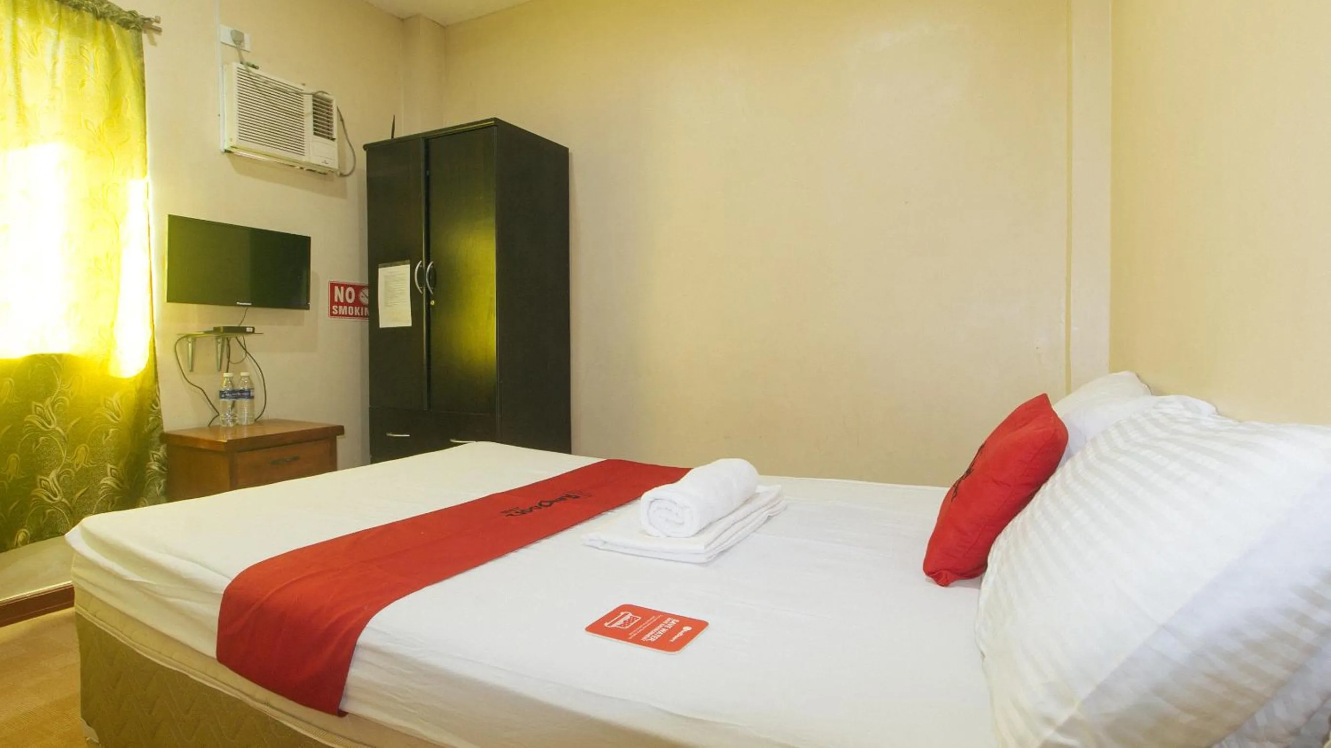 Bed in RedDoorz near Talisay District Hospital