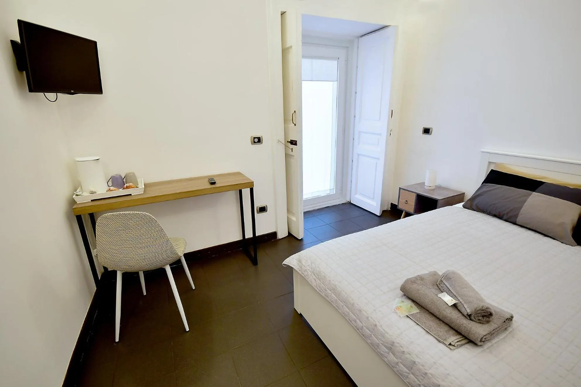 Bed in Di affreschi e volte