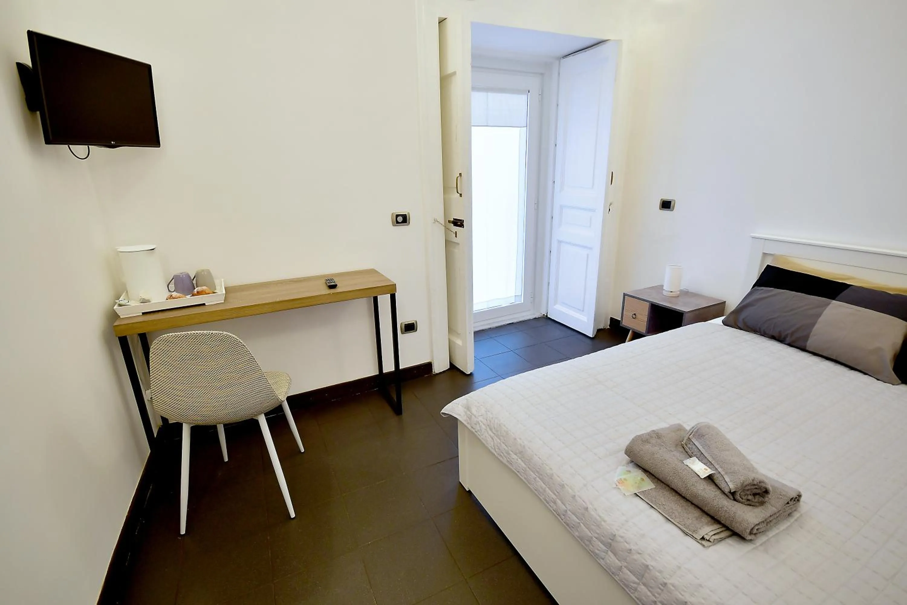 Bed in Di affreschi e volte