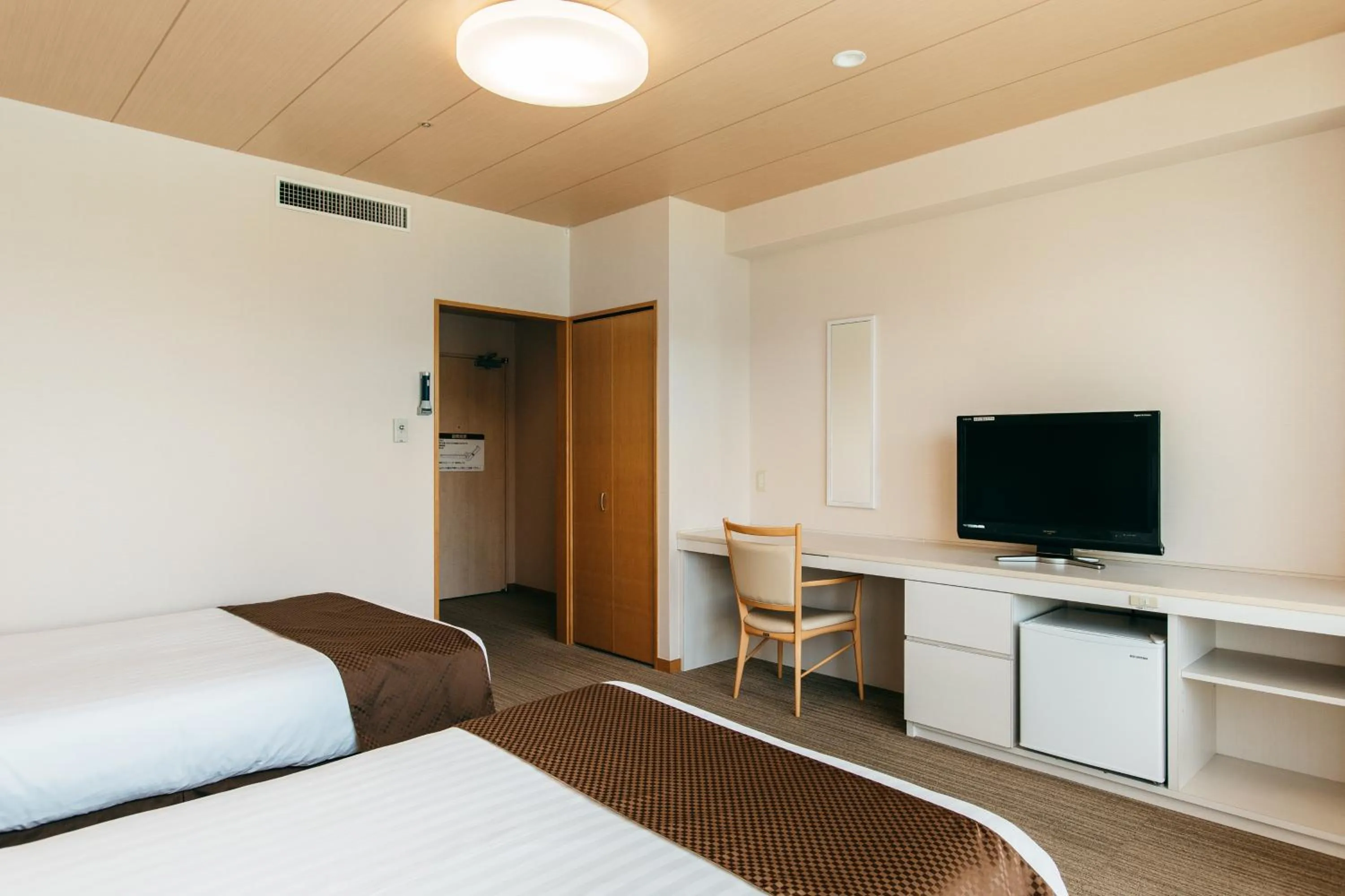 Bed in KAMENOI HOTEL Kii-Tanabe