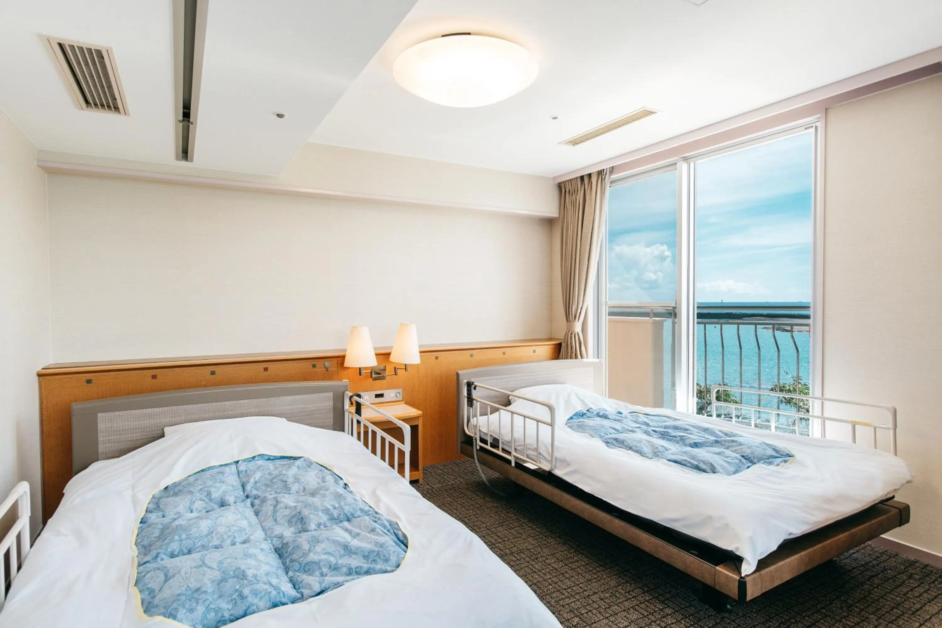 Bed in KAMENOI HOTEL Kii-Tanabe