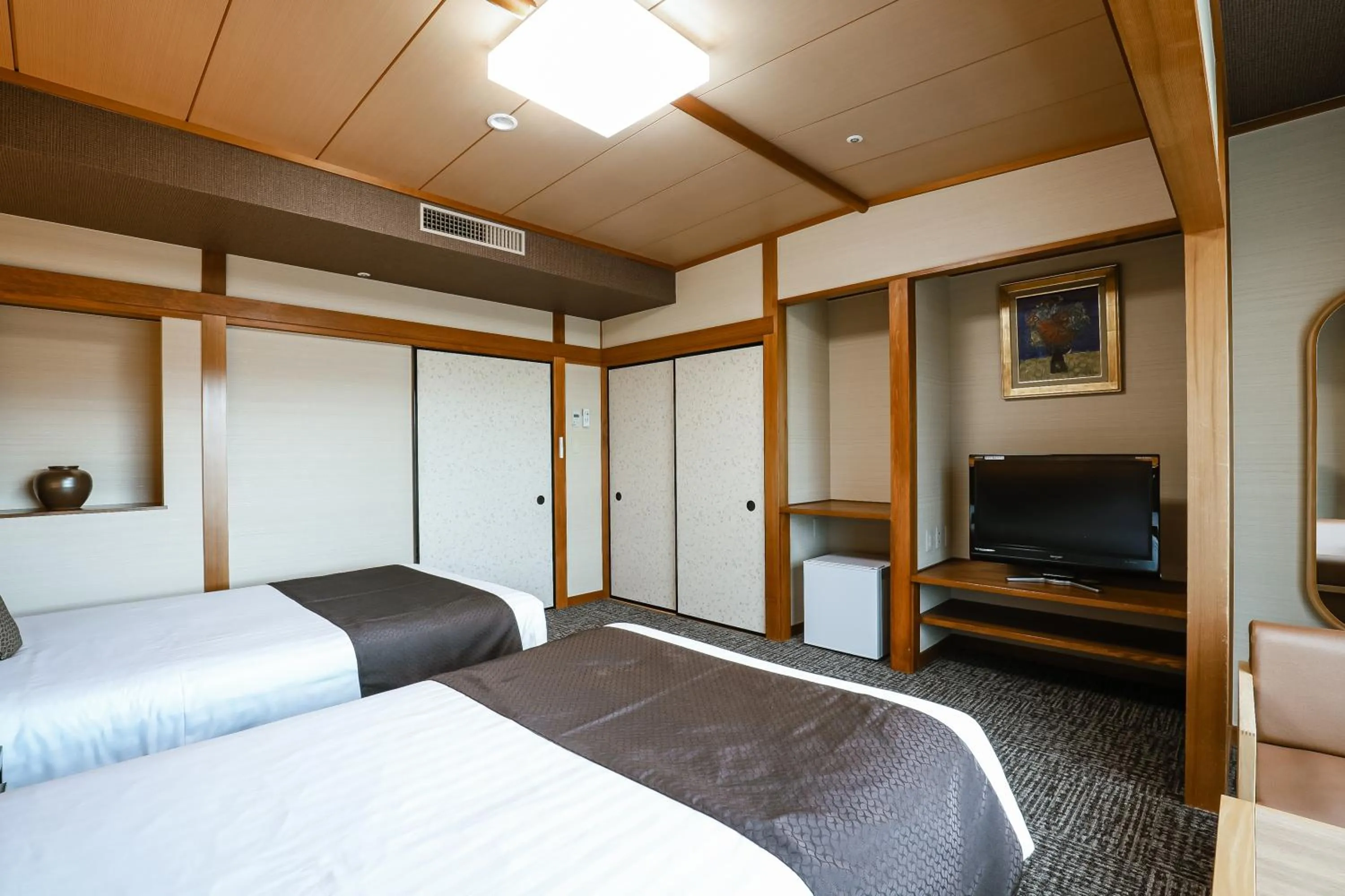 Photo of the whole room, Bed in KAMENOI HOTEL Kochi