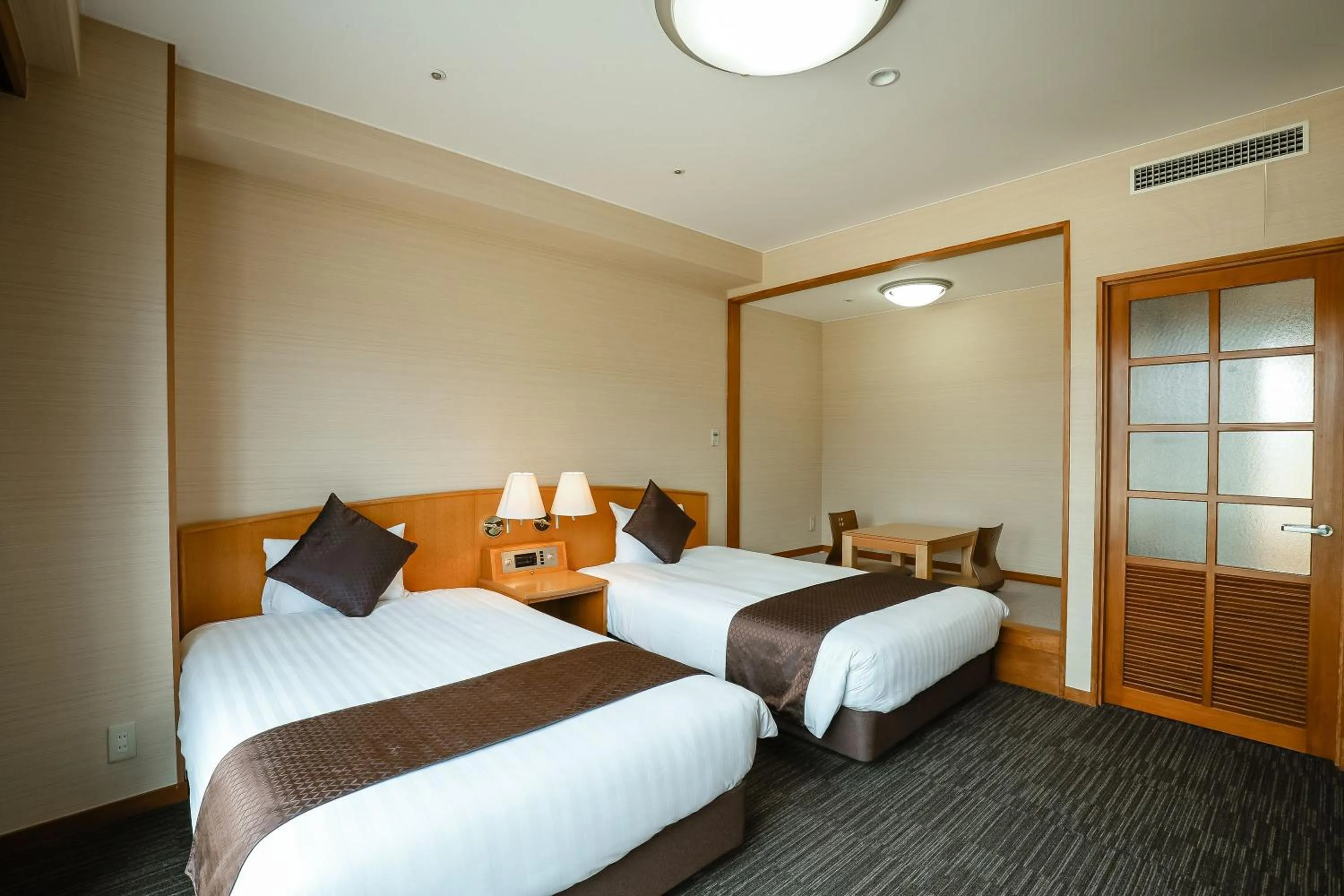 Photo of the whole room, Bed in KAMENOI HOTEL Kochi