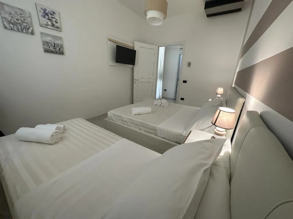 Bed in Porto Cesareo Hotel