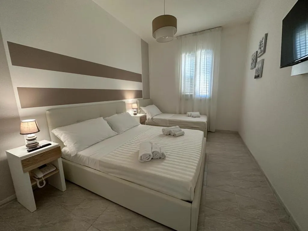 Bed in Porto Cesareo Hotel