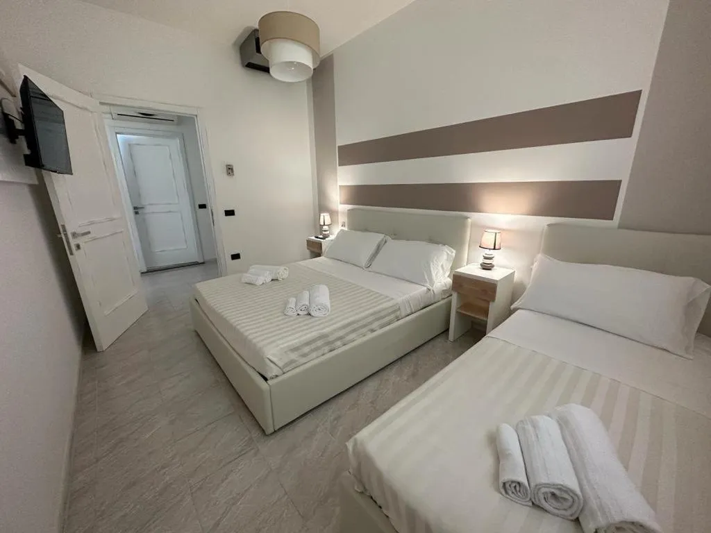 Bed in Porto Cesareo Hotel