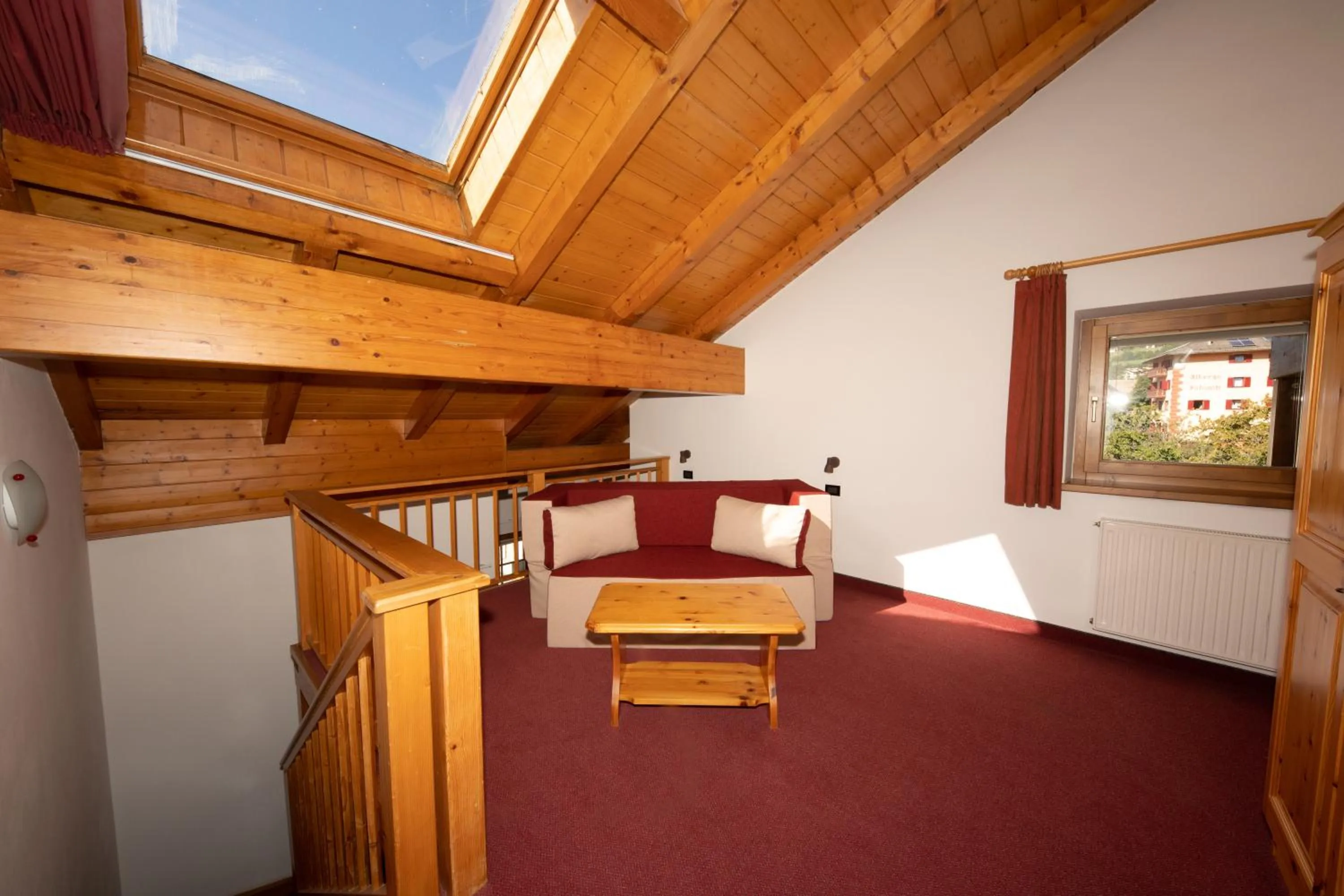 Seating area, Bed in Garni Manuela