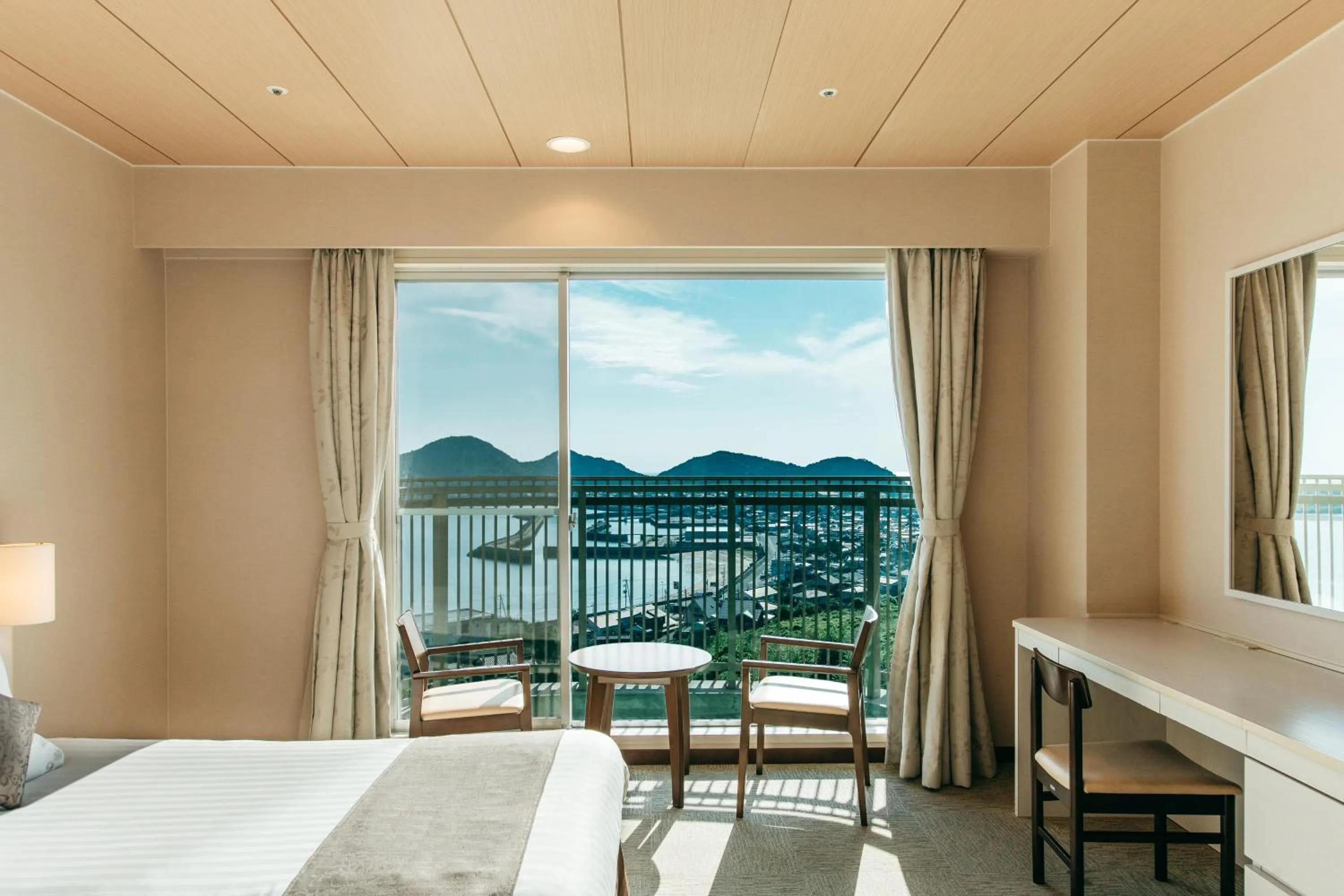 View (from property/room), Bed in KAMENOI HOTEL Setouchi Hikari