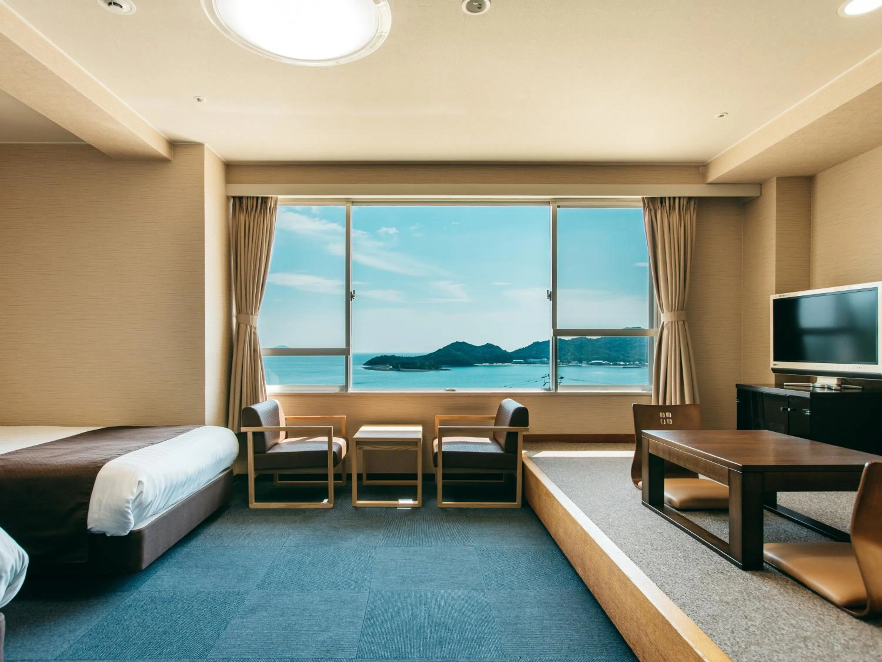 Photo of the whole room, Bed in KAMENOI HOTEL Setouchi Hikari