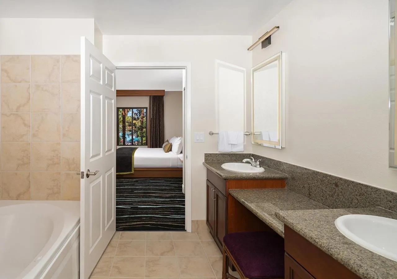 Bathroom, Bed in Tahiti Village Resort & Spa