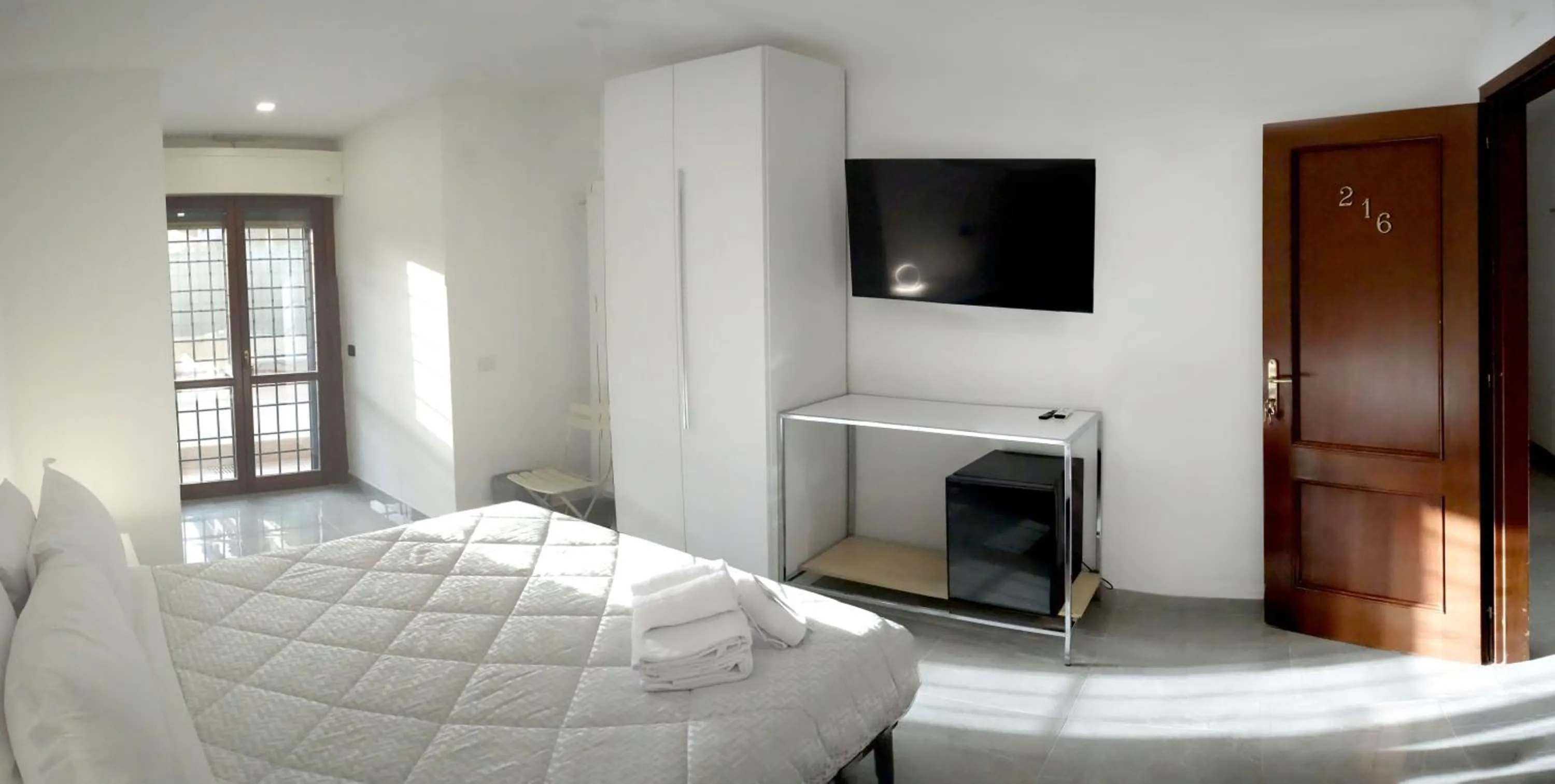 Bed in La Fiera GuestHouse