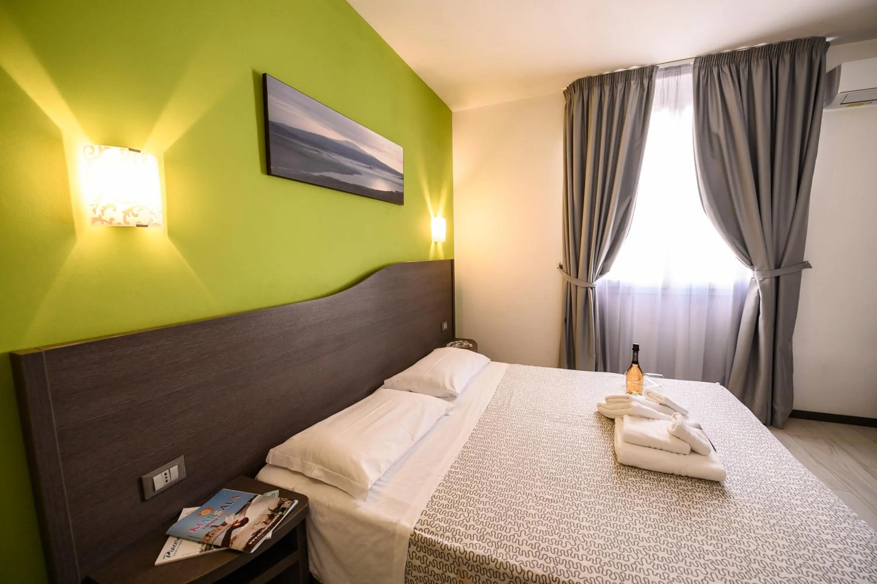 Bed in Hotel Rainbow Resort