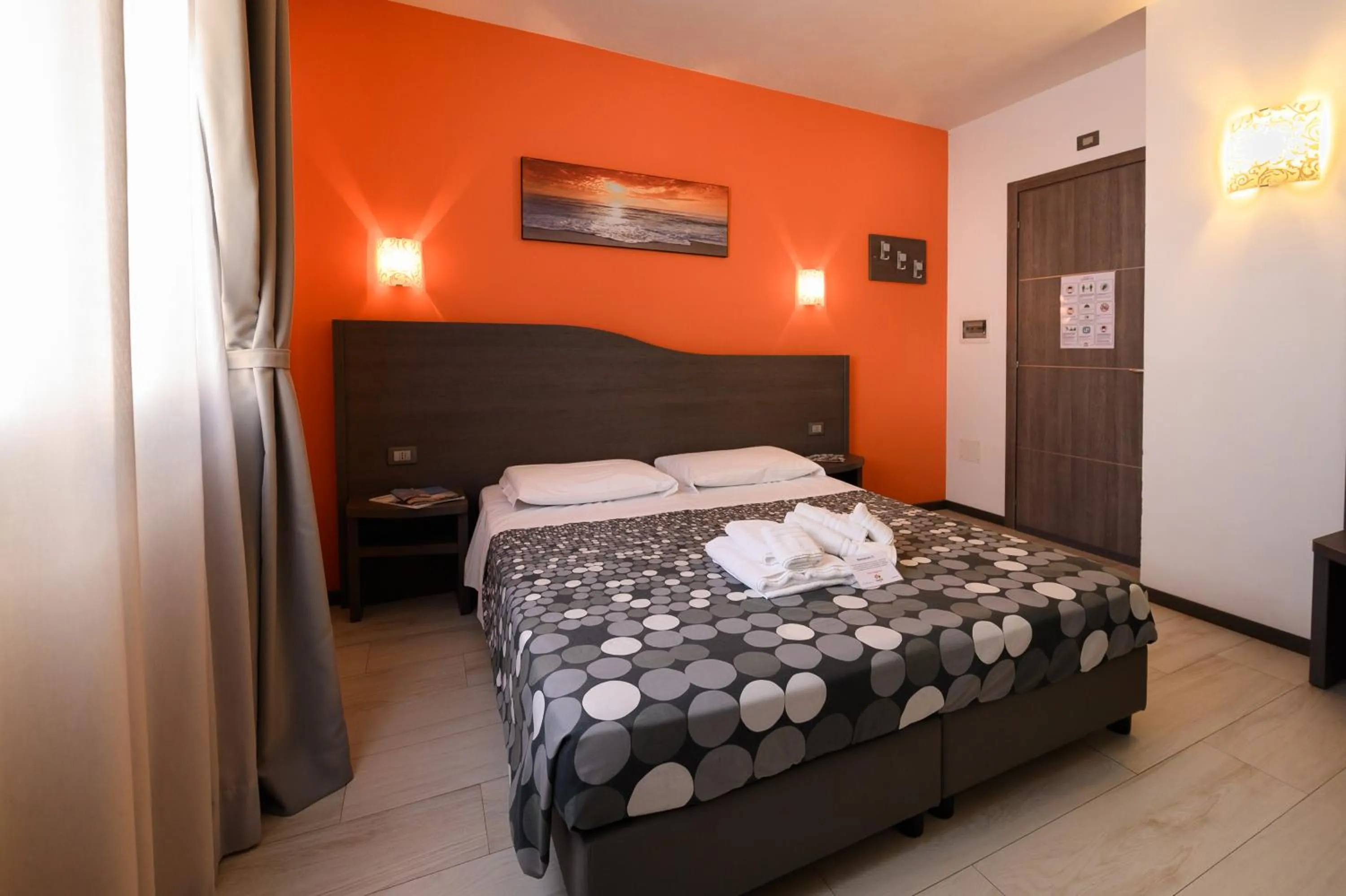 Bed in Hotel Rainbow Resort