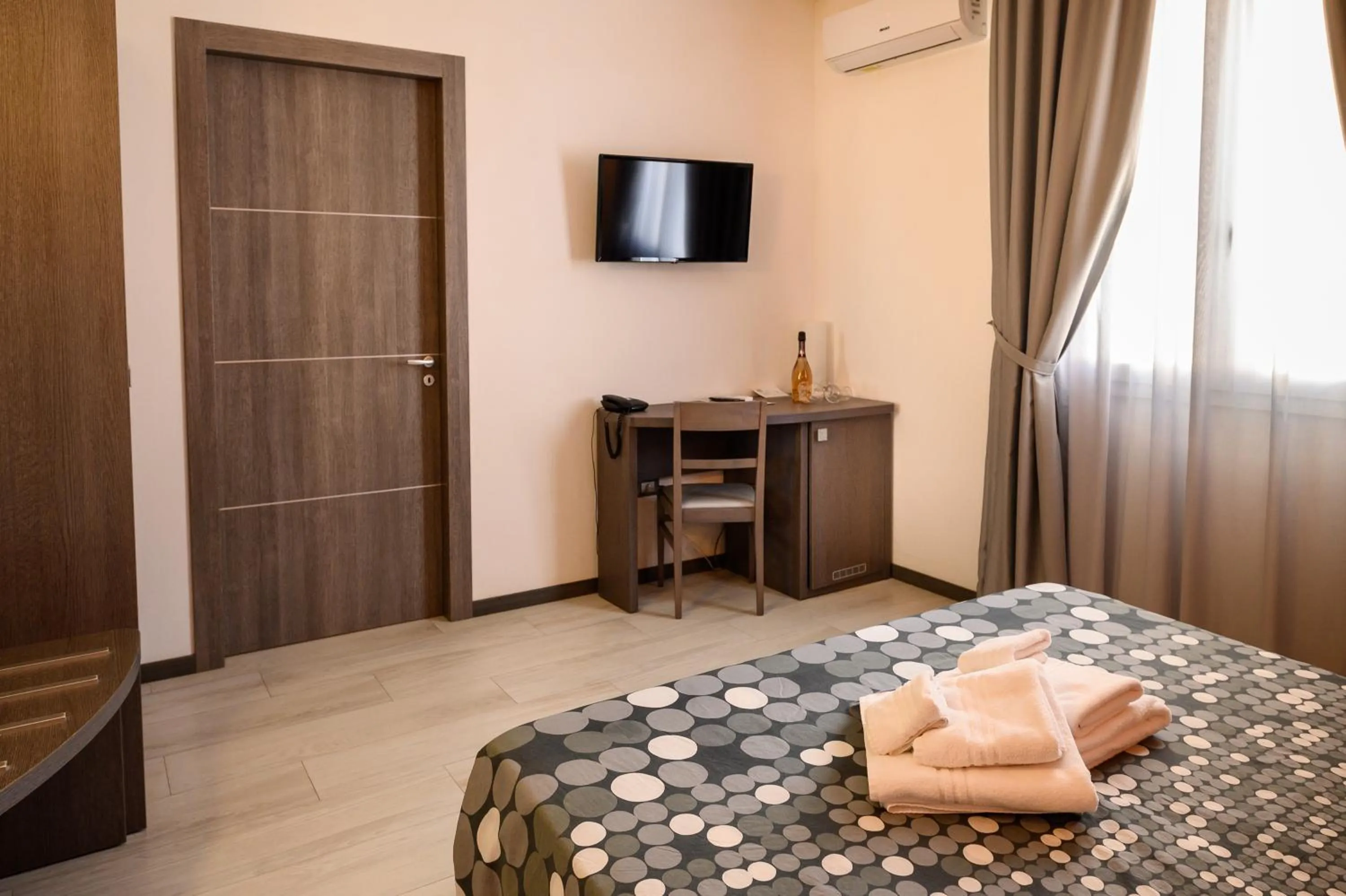 Bed in Hotel Rainbow Resort