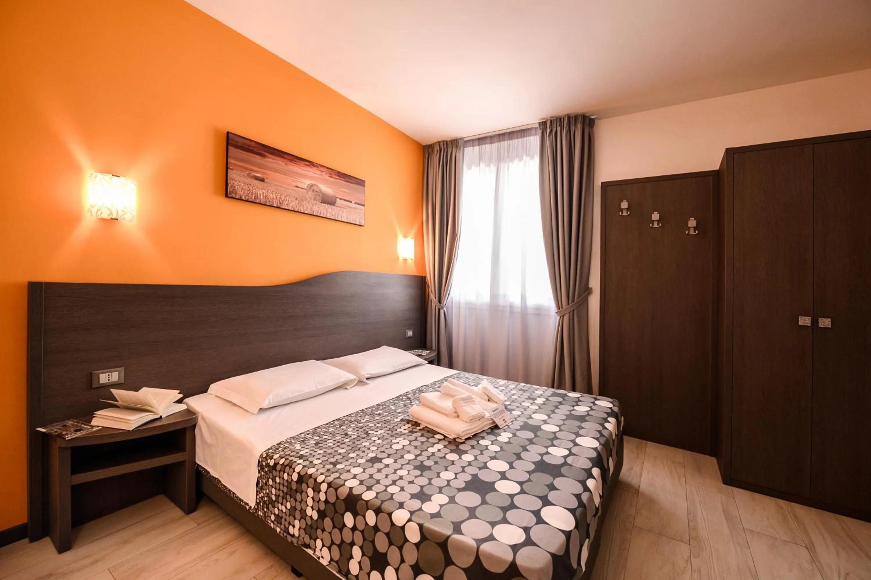 Bed in Hotel Rainbow Resort