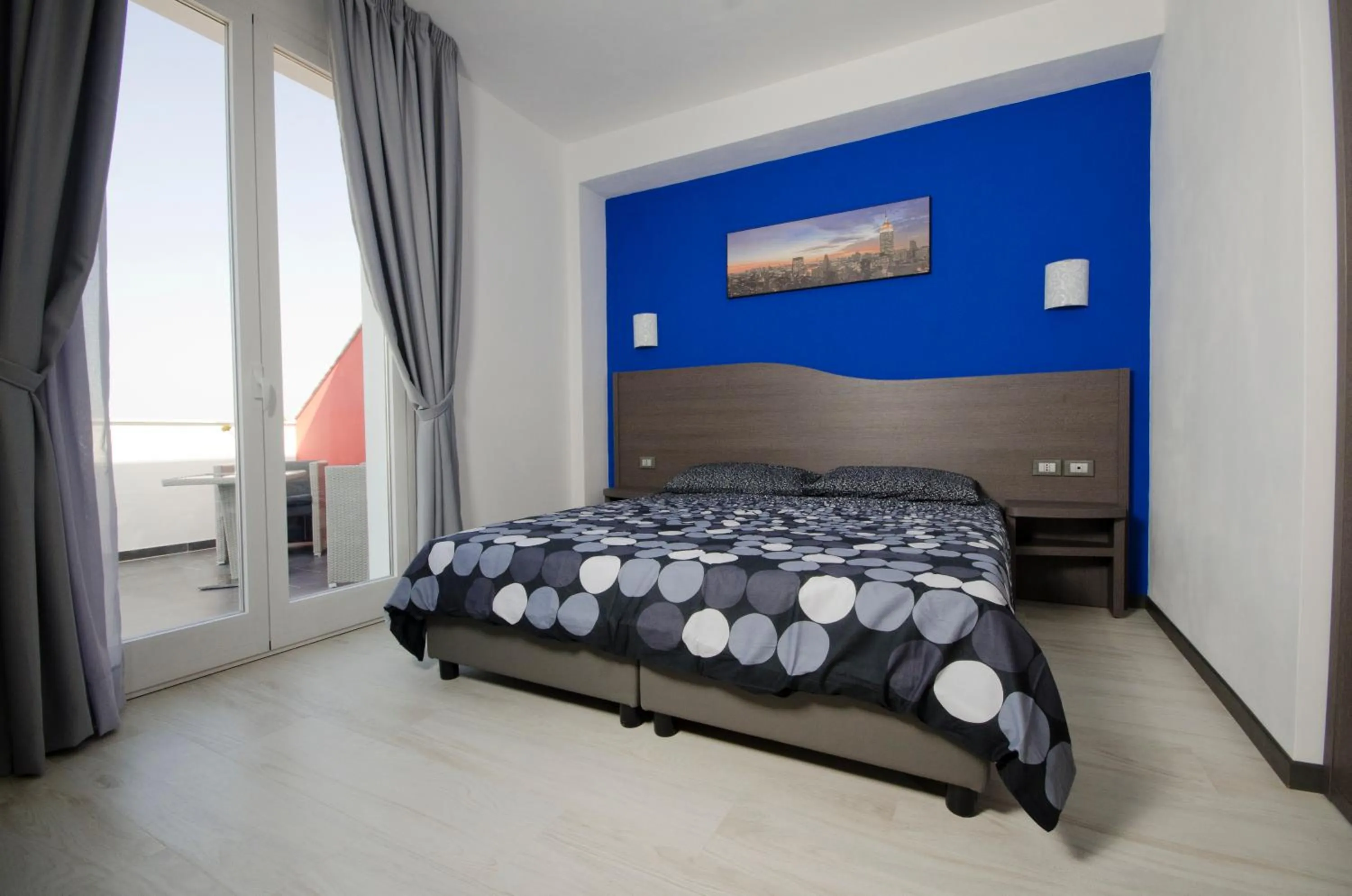 Bed in Hotel Rainbow Resort