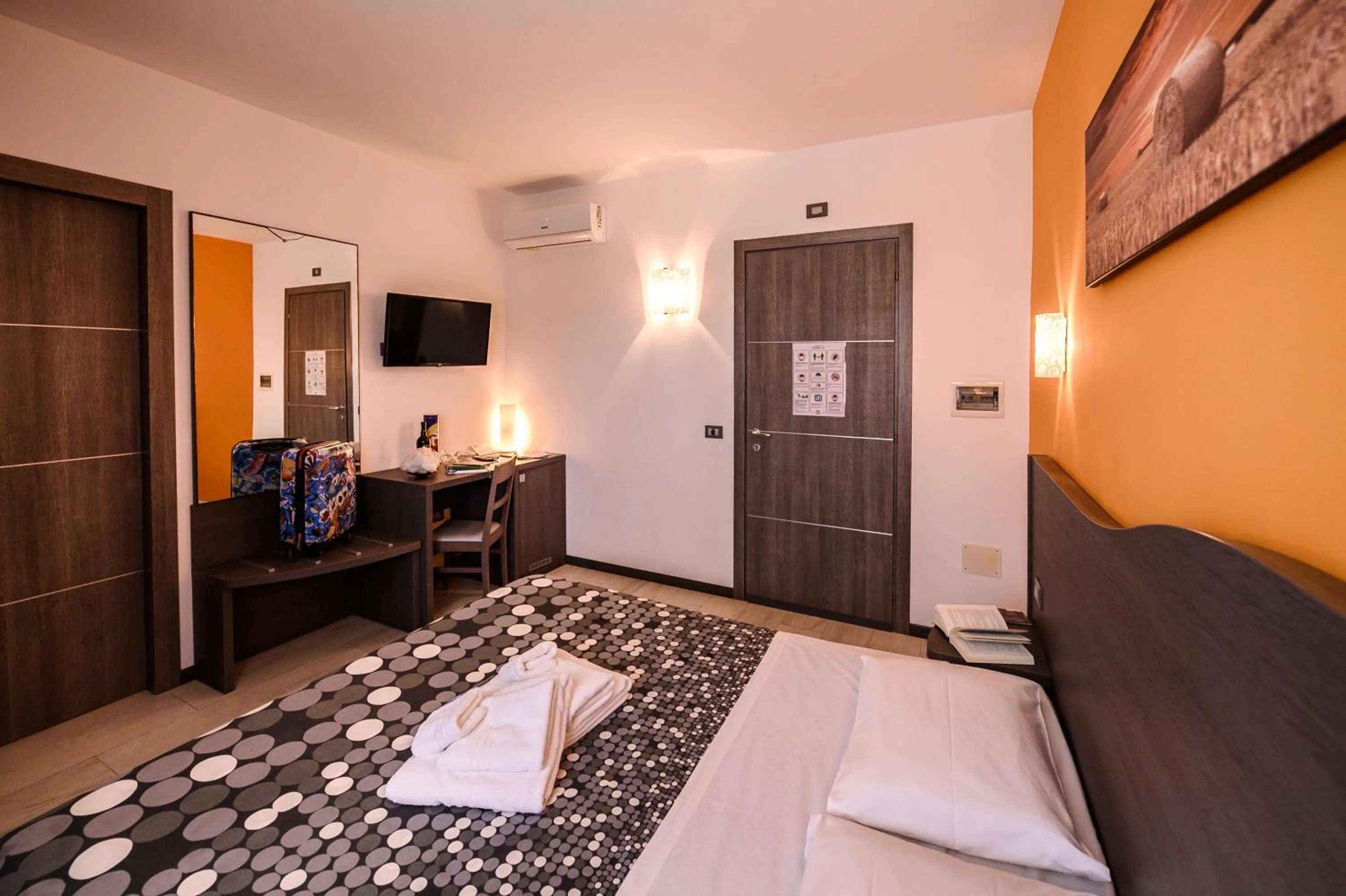 Bed in Hotel Rainbow Resort