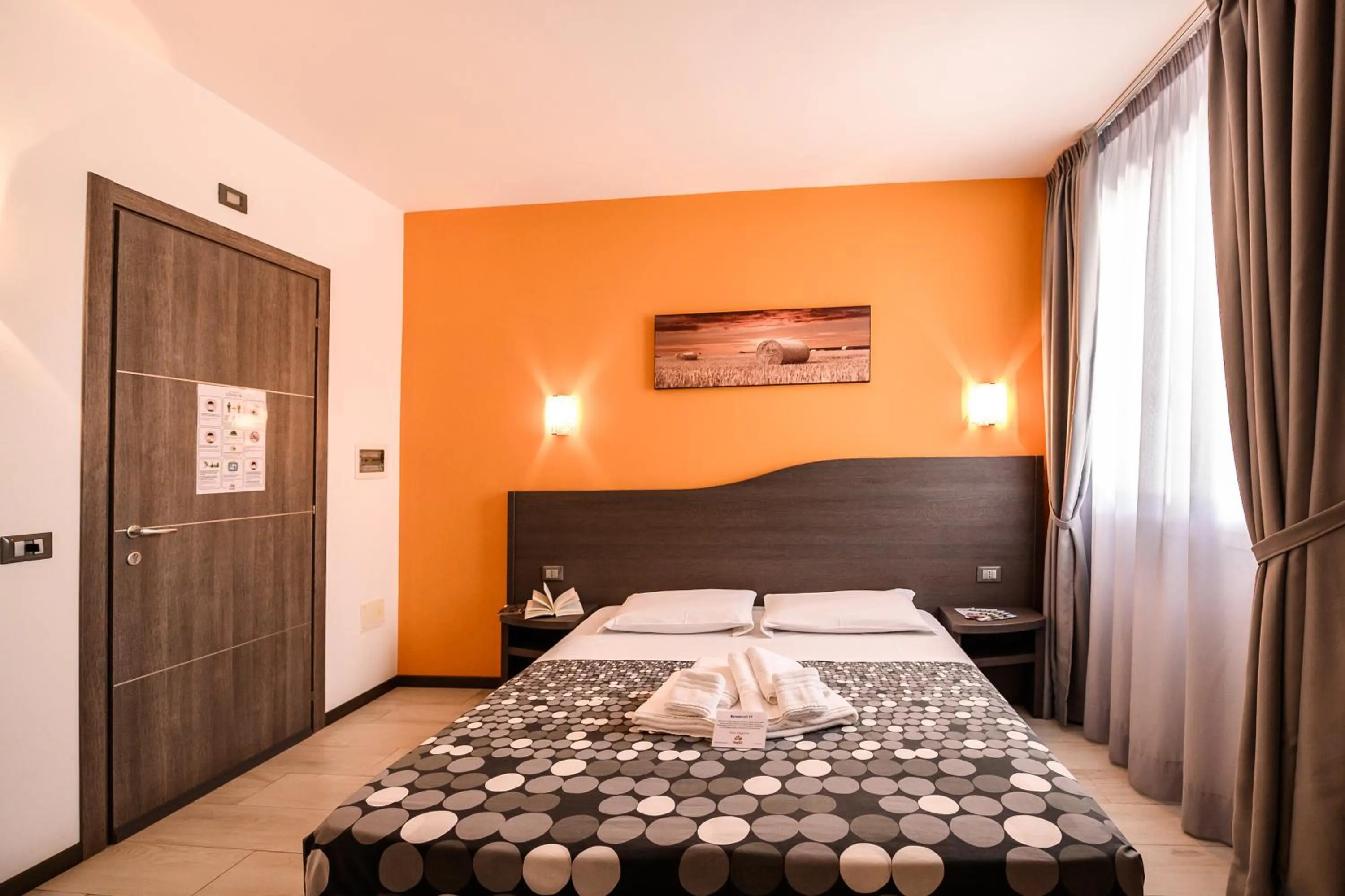 Bed in Hotel Rainbow Resort