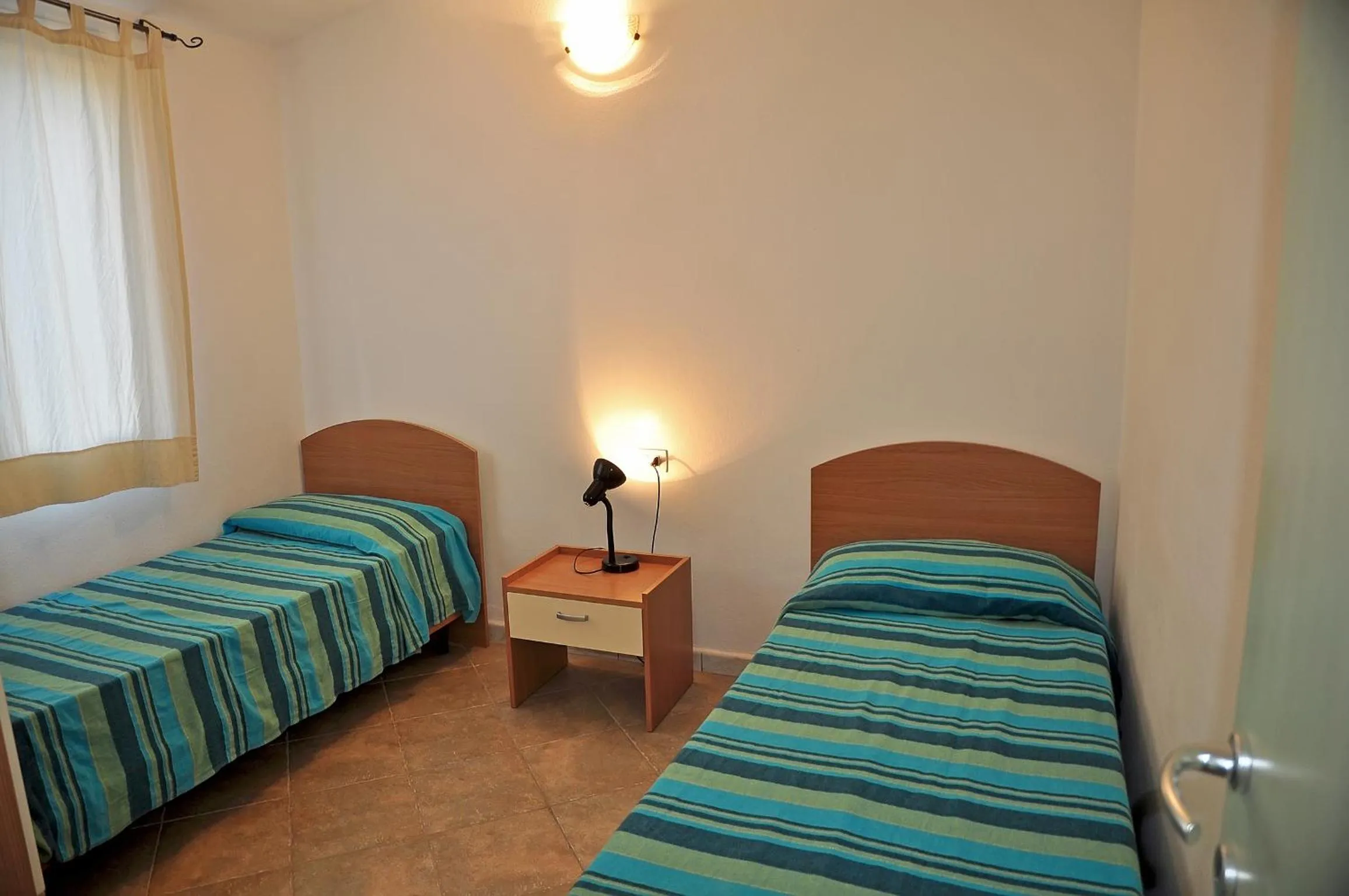 Bed in Residenze Mare e Pineta