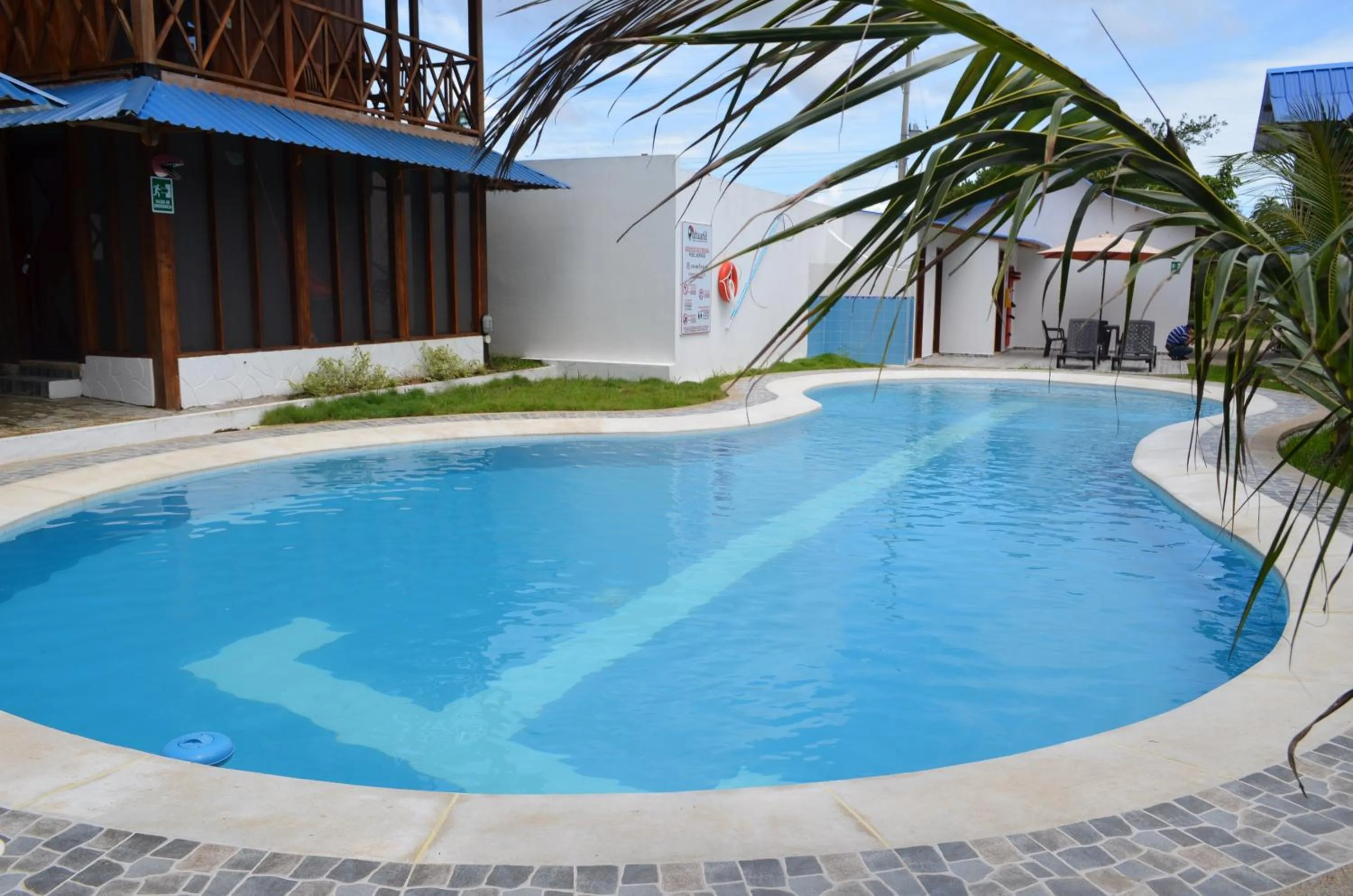 Swimming pool in Hotel Utüane