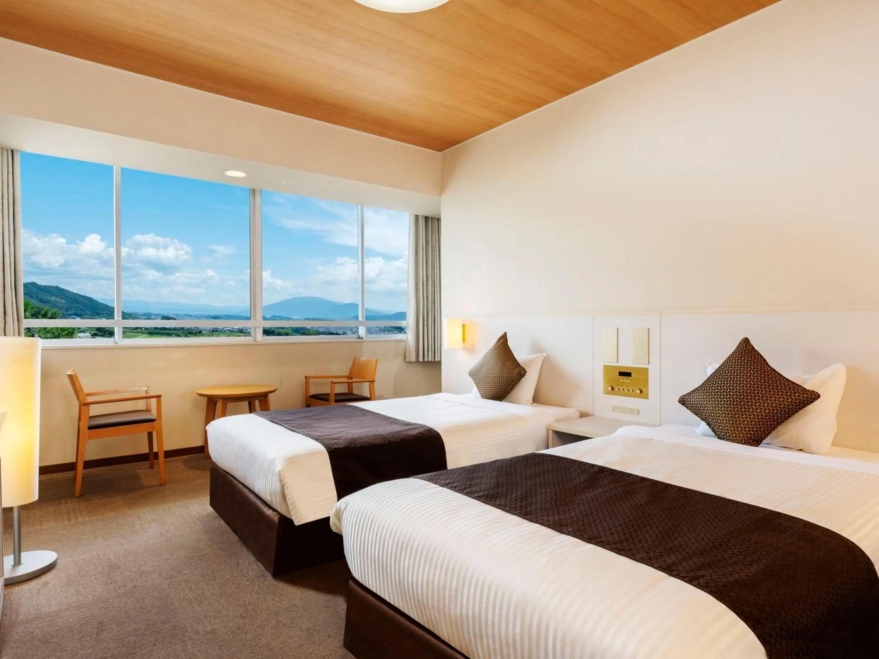 Photo of the whole room, Bed in KAMENOI HOTEL Yamato Heguri