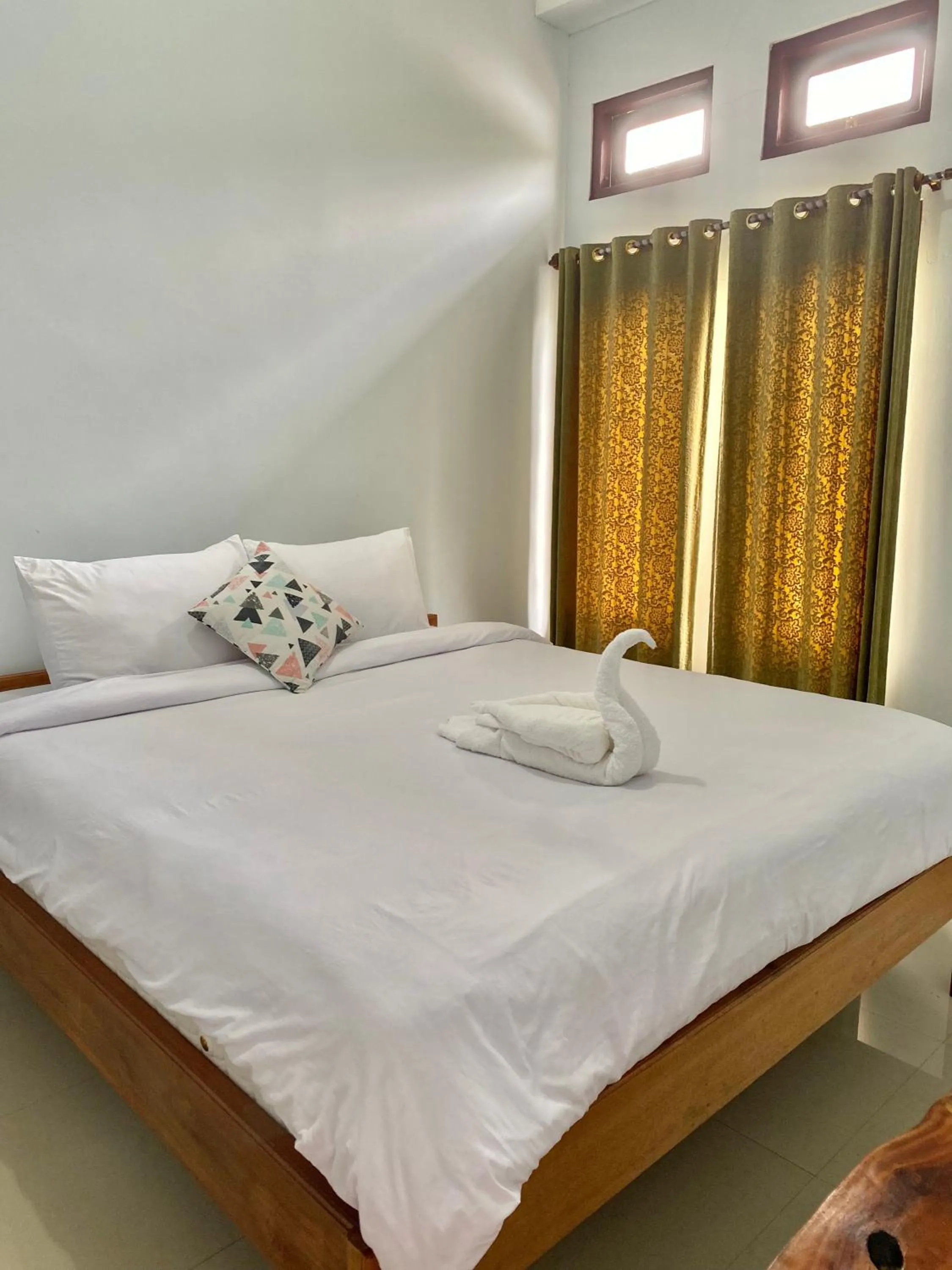 Bed in Santiago Bed and Breakfast at Desa Wisata Moni