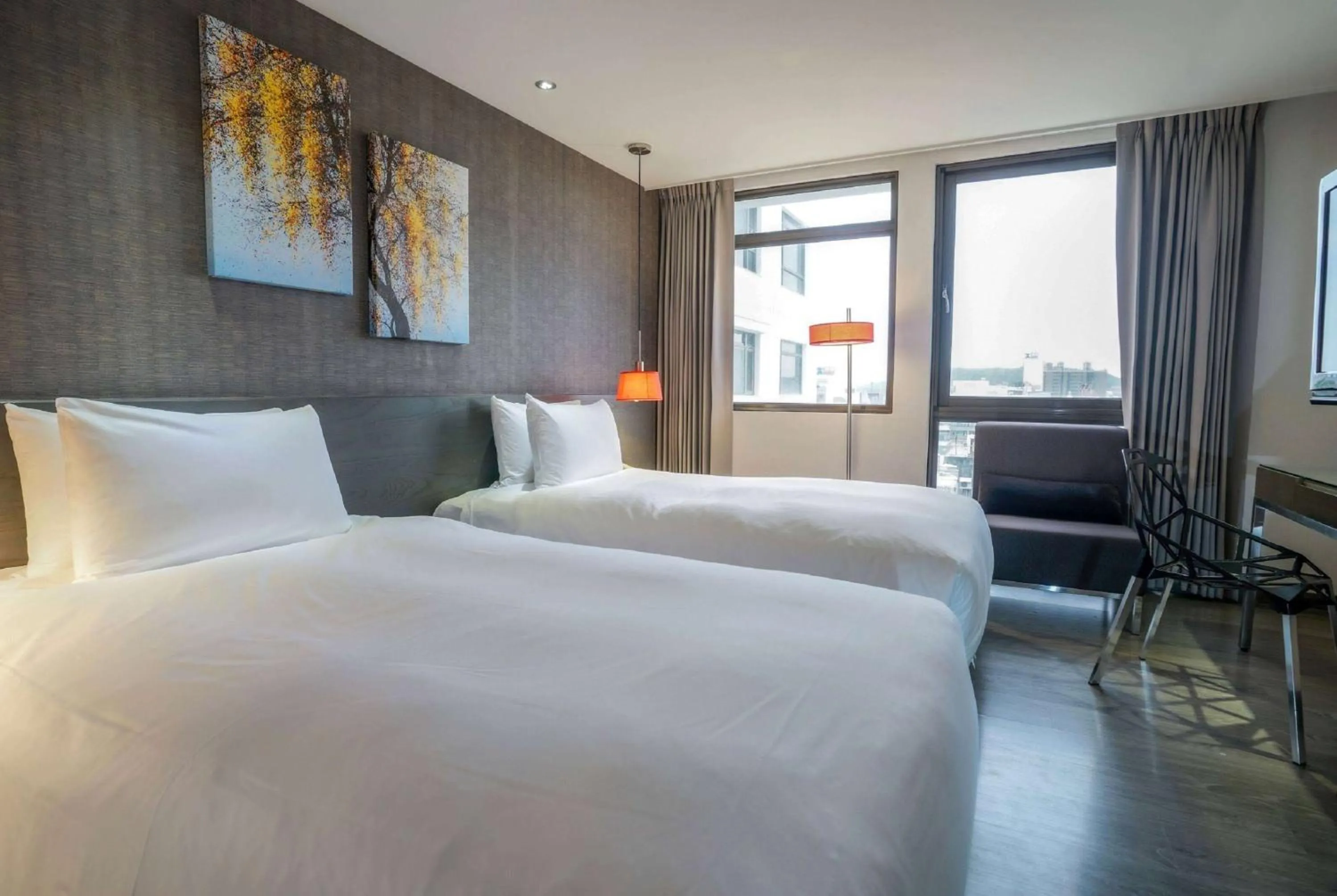 Photo of the whole room, Bed in Ramada Encore By Wyndham Hualien