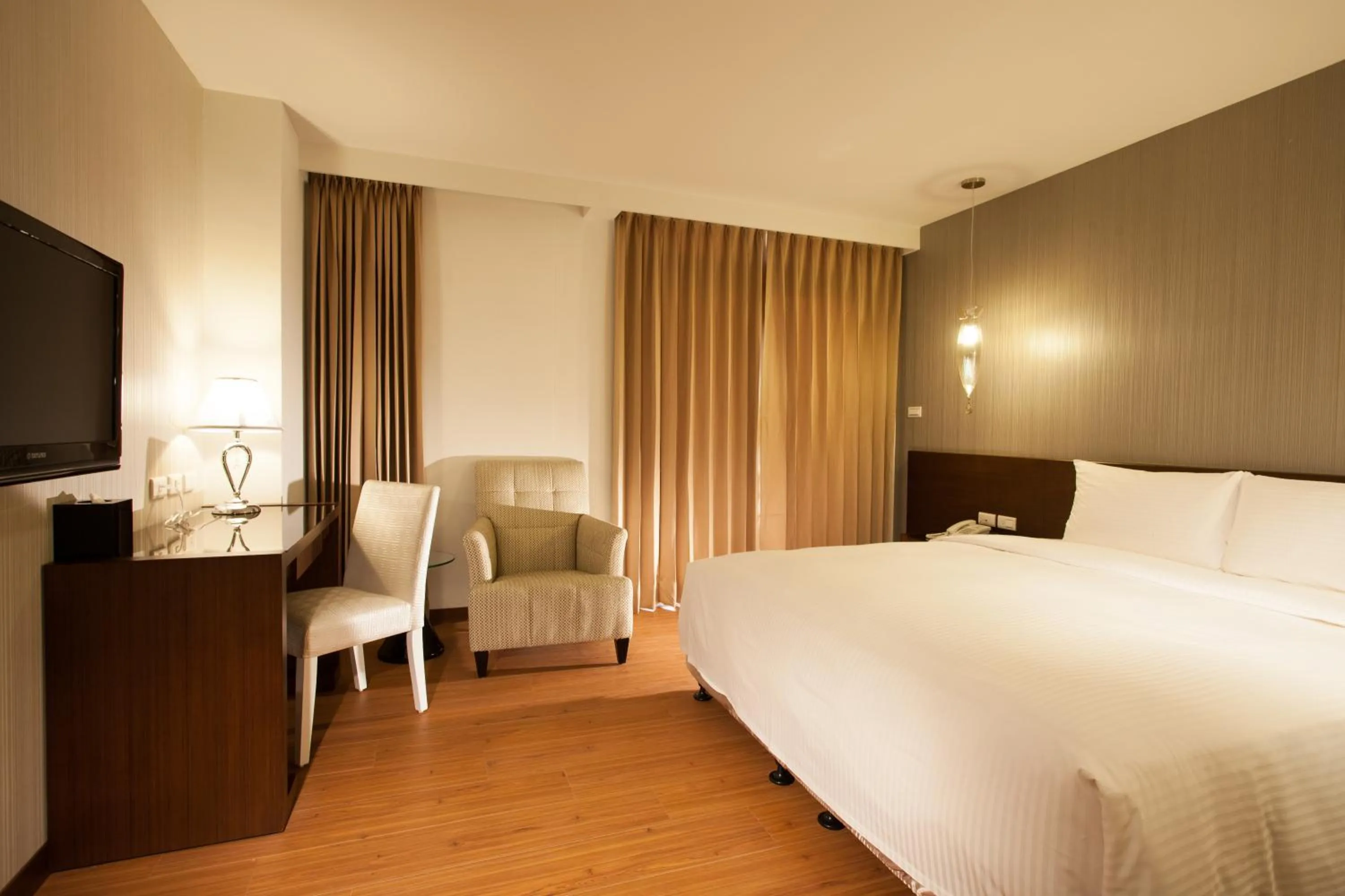 Bed in Ramada Encore By Wyndham Hualien
