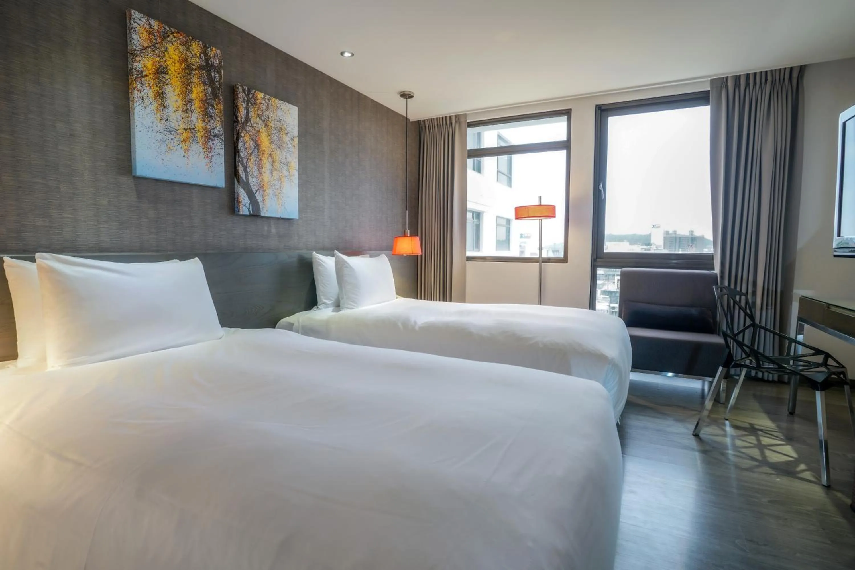 Photo of the whole room, Bed in Ramada Encore By Wyndham Hualien