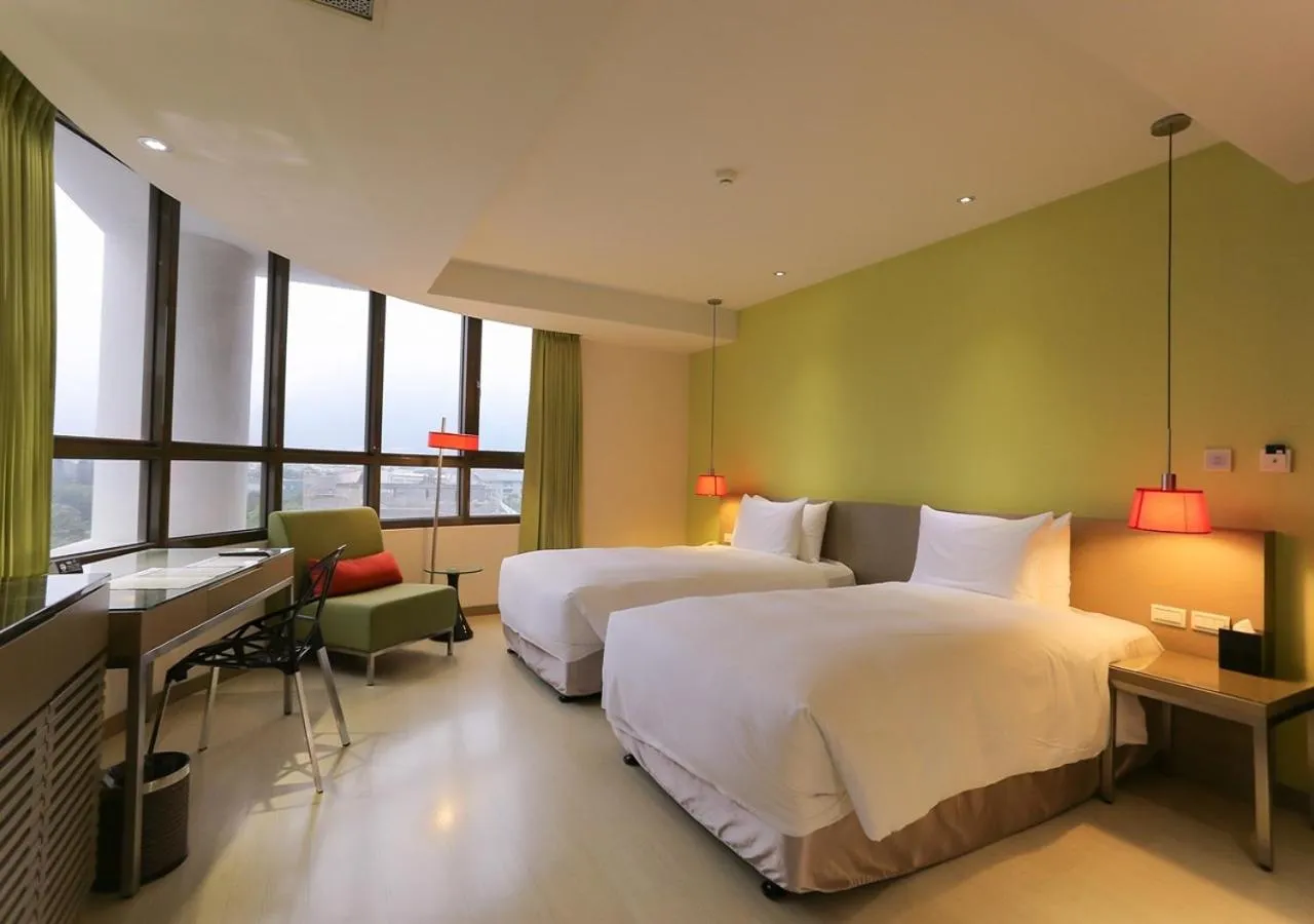 Photo of the whole room, Bed in Ramada Encore By Wyndham Hualien