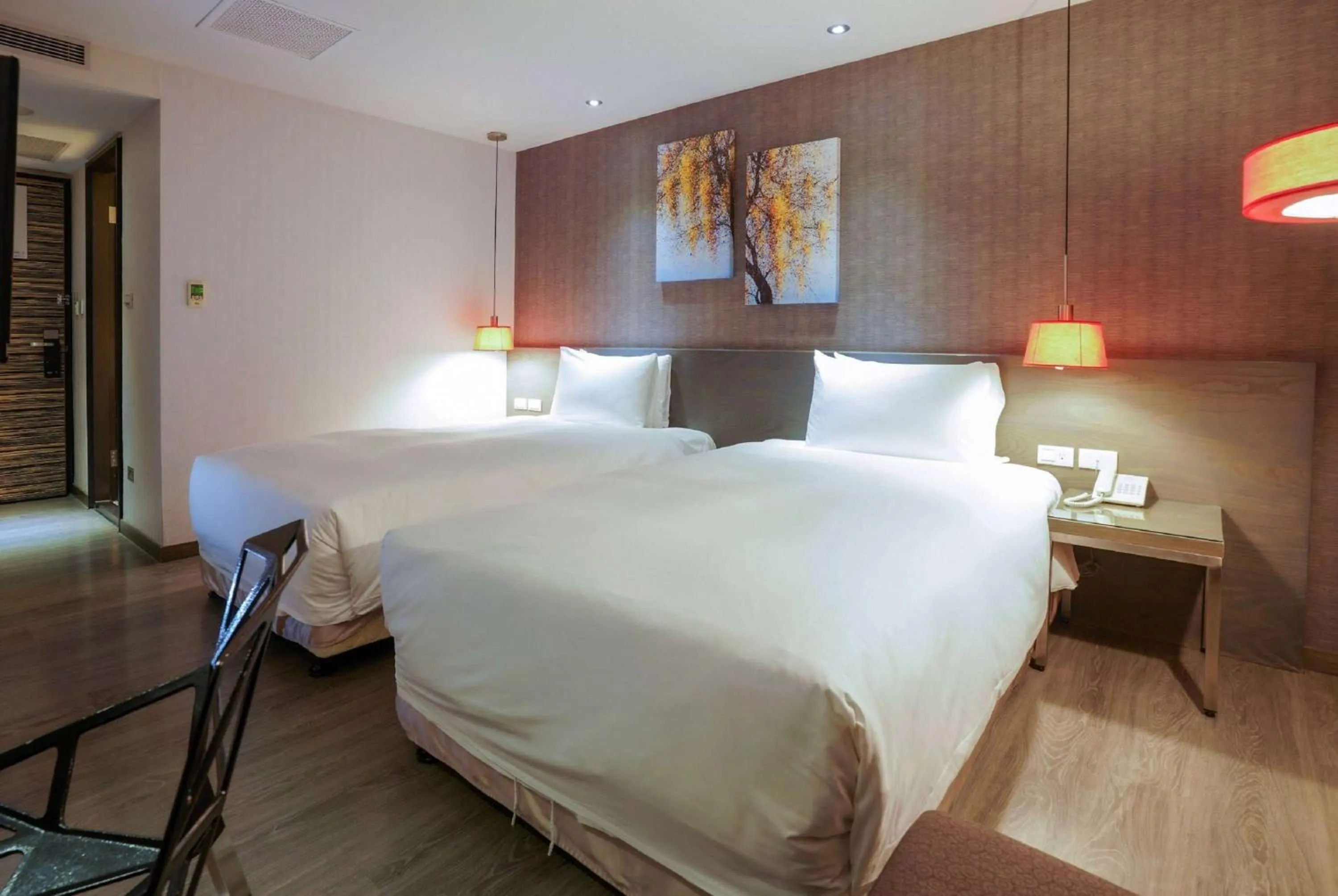 Photo of the whole room, Bed in Ramada Encore By Wyndham Hualien
