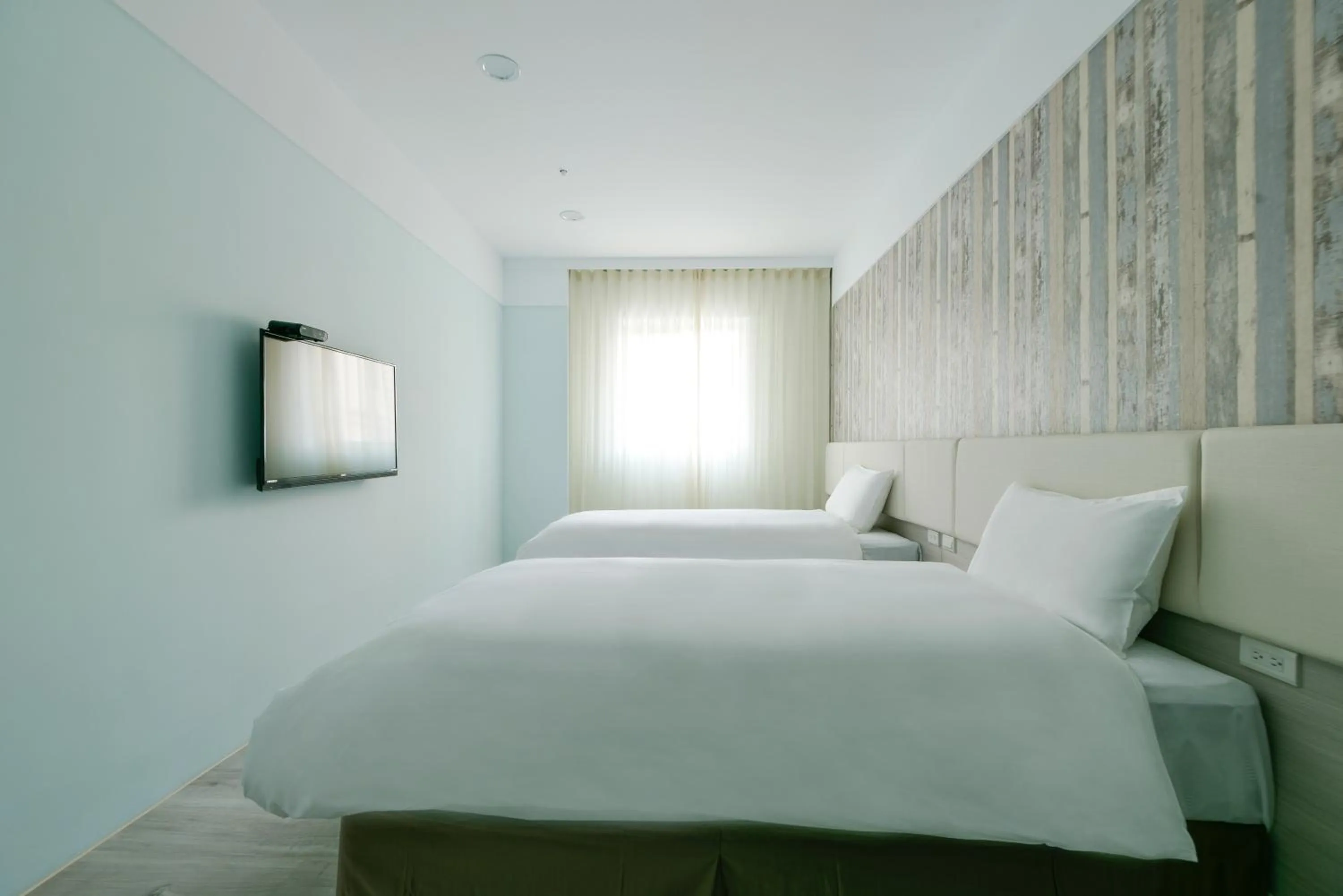 Bed in Fengjia JinRui Hotel