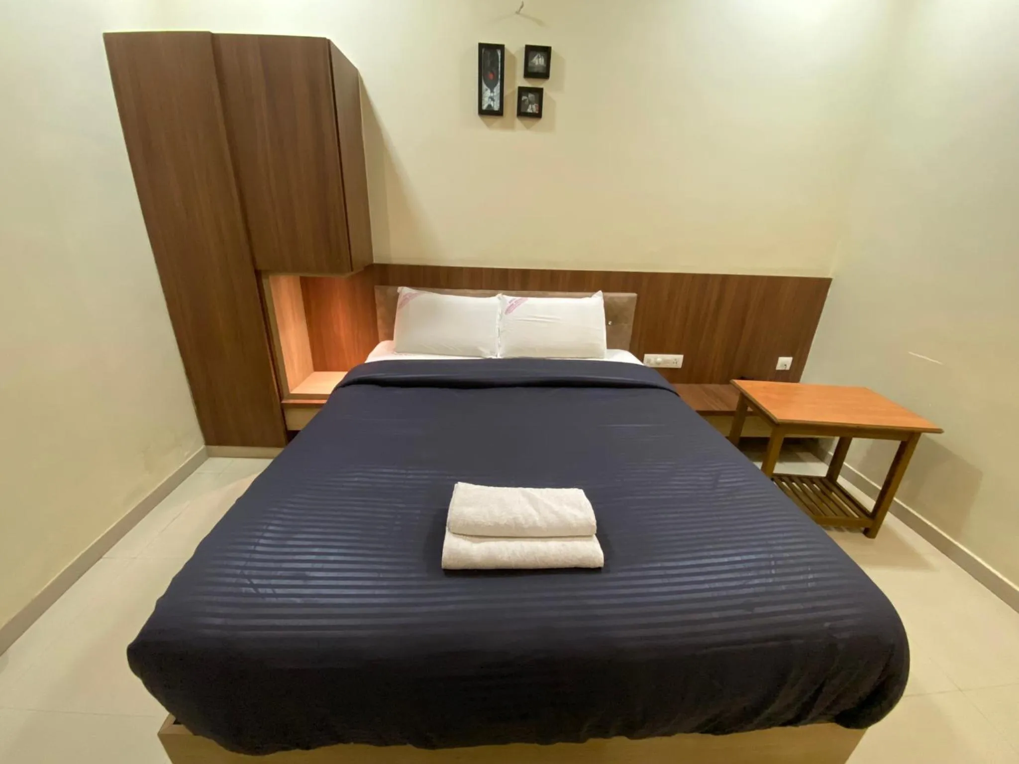 Bed in Hotel Lakshmi Residency