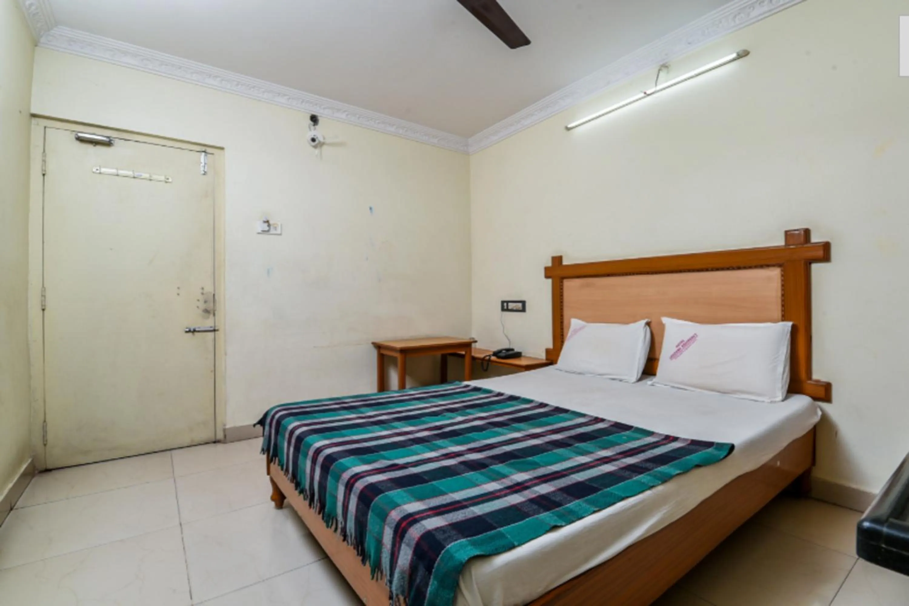 Bed in Hotel Lakshmi Residency