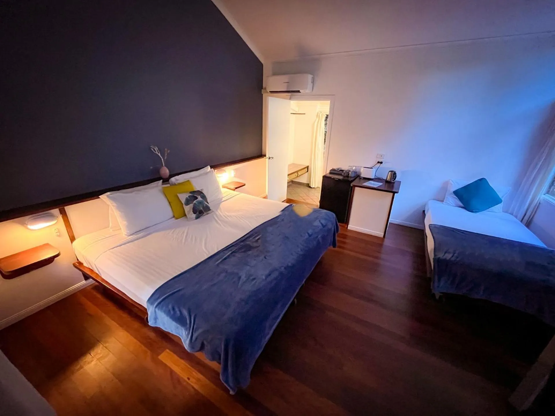 Bed in Ferntree Rainforest Lodge