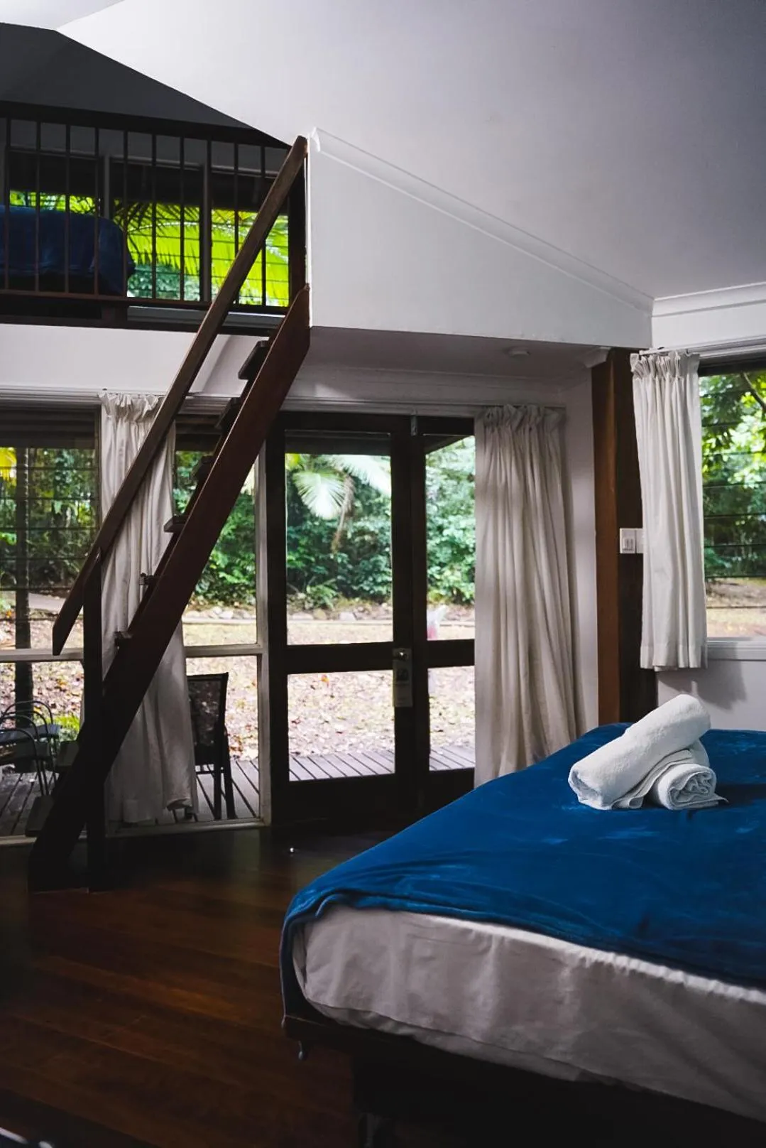 Bed in Ferntree Rainforest Lodge