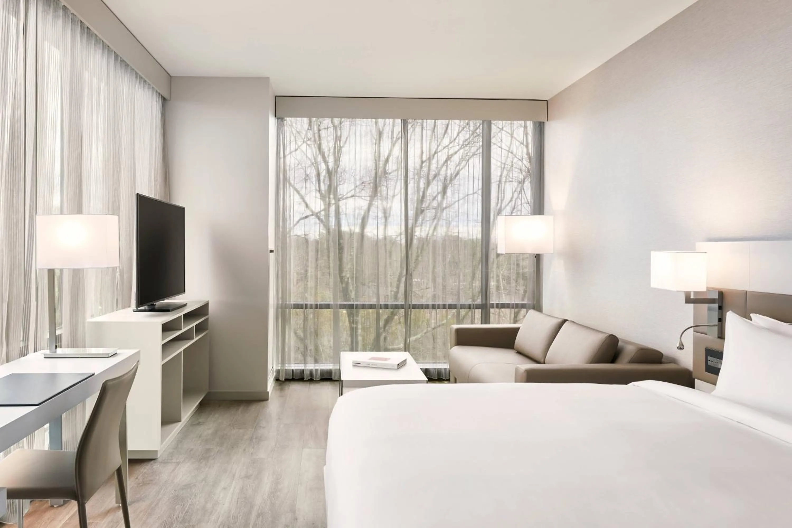 Photo of the whole room, Bed in AC Hotel by Marriott Charlotte SouthPark