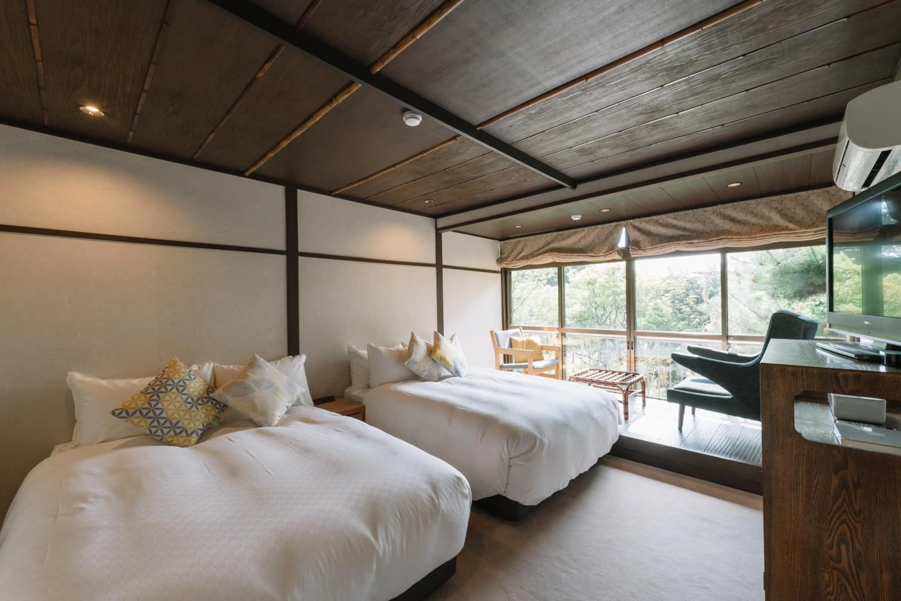 Photo of the whole room, Bed in Kyoto Nanzenji Ryokan Yachiyo Established in 1915
