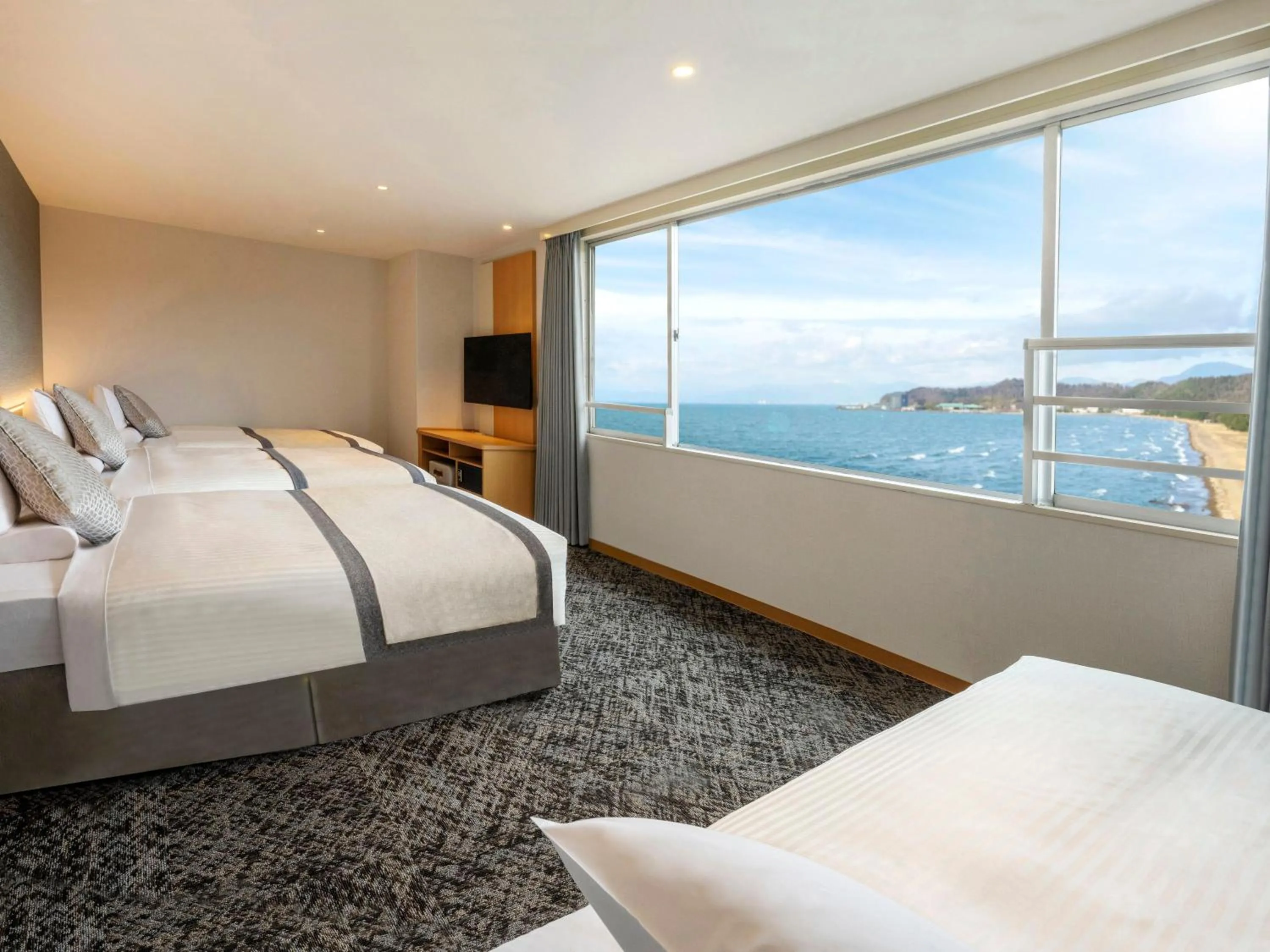 Photo of the whole room, Bed in KAMENOI HOTEL Hikone