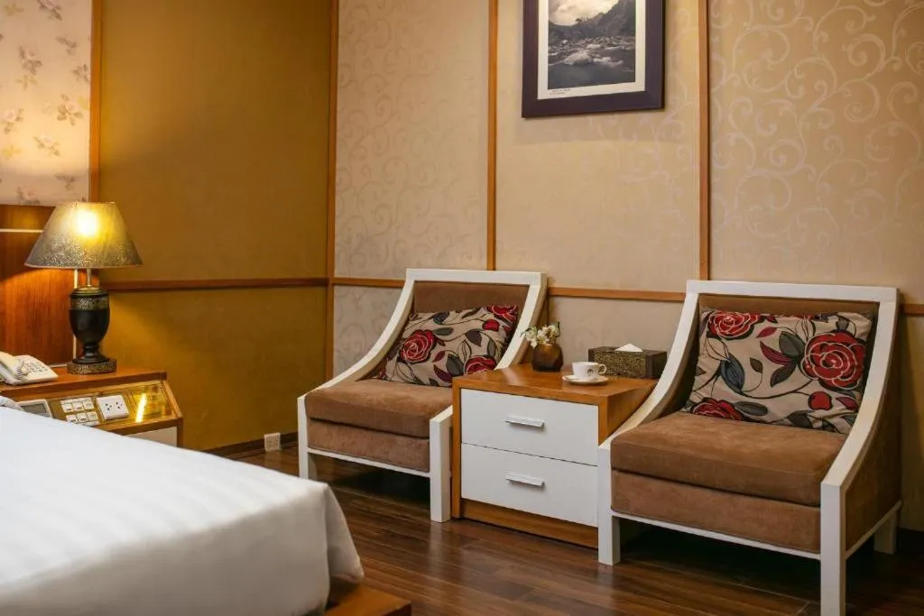 Seating area, Bed in Nesta Boutique Hotel Hanoi